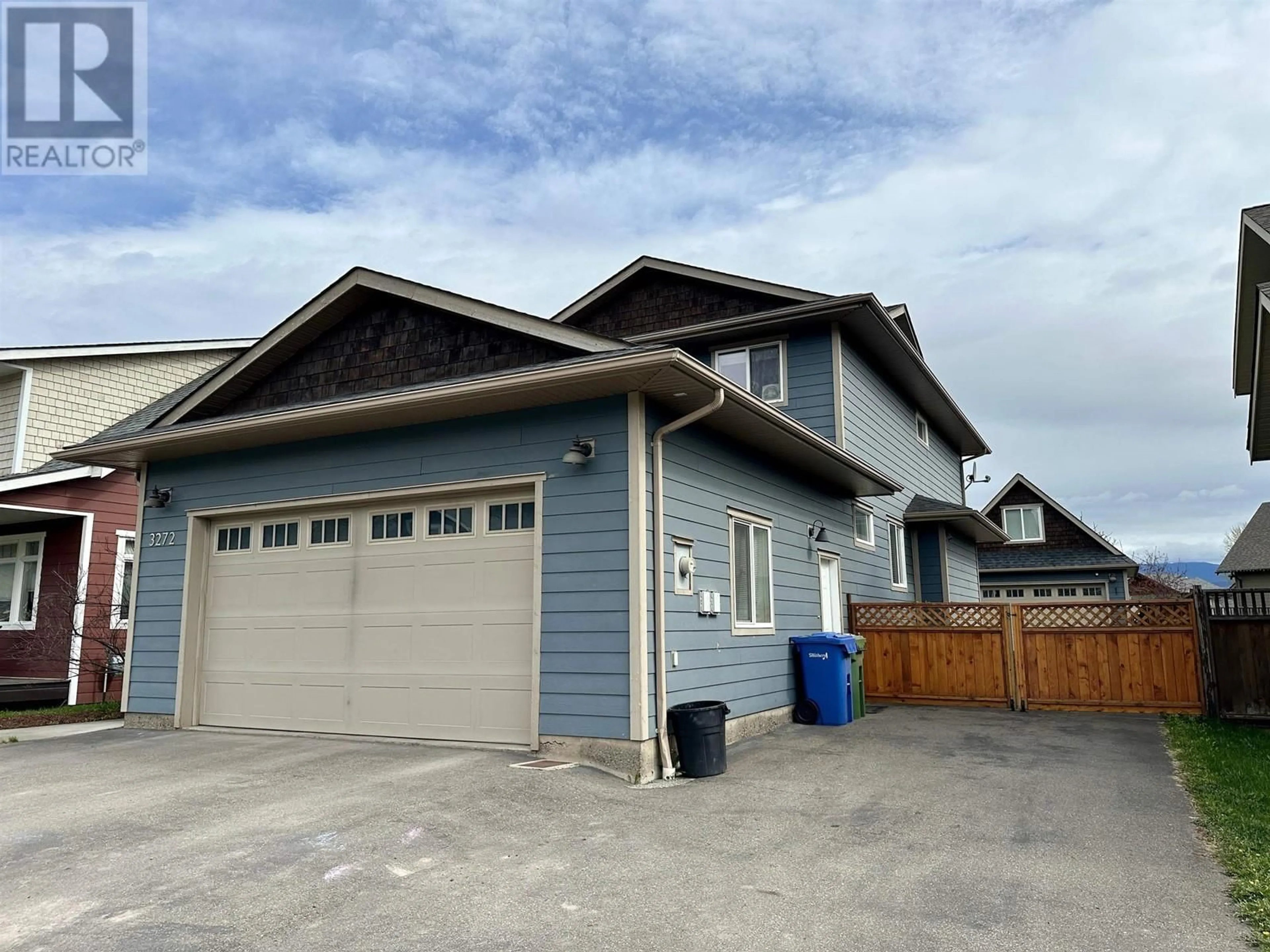 Home with vinyl exterior material, street for 3272 TURNER WAY, Smithers British Columbia V0J2N0