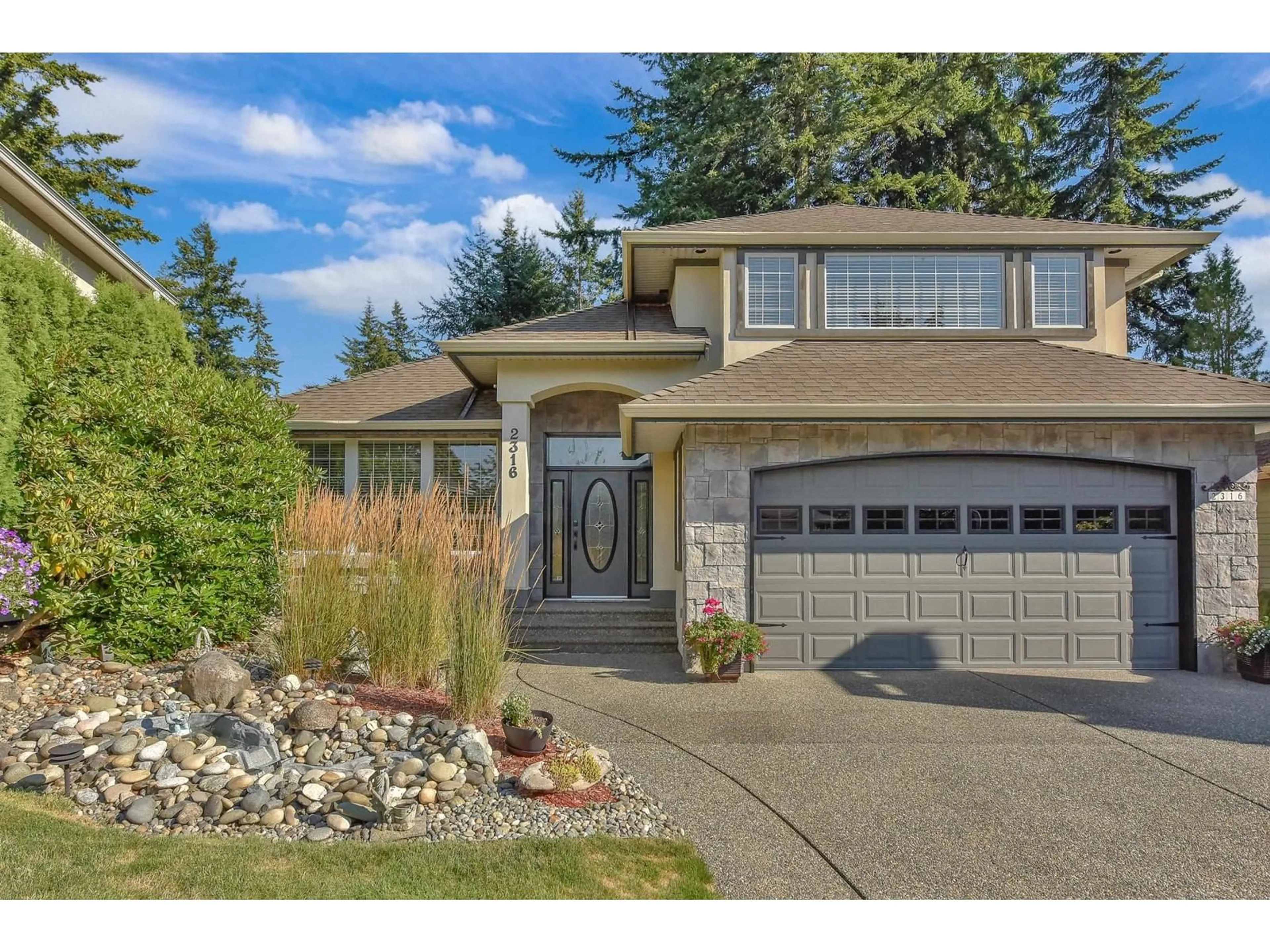 Home with vinyl exterior material, street for 2316 140A, Surrey British Columbia V4A9V3