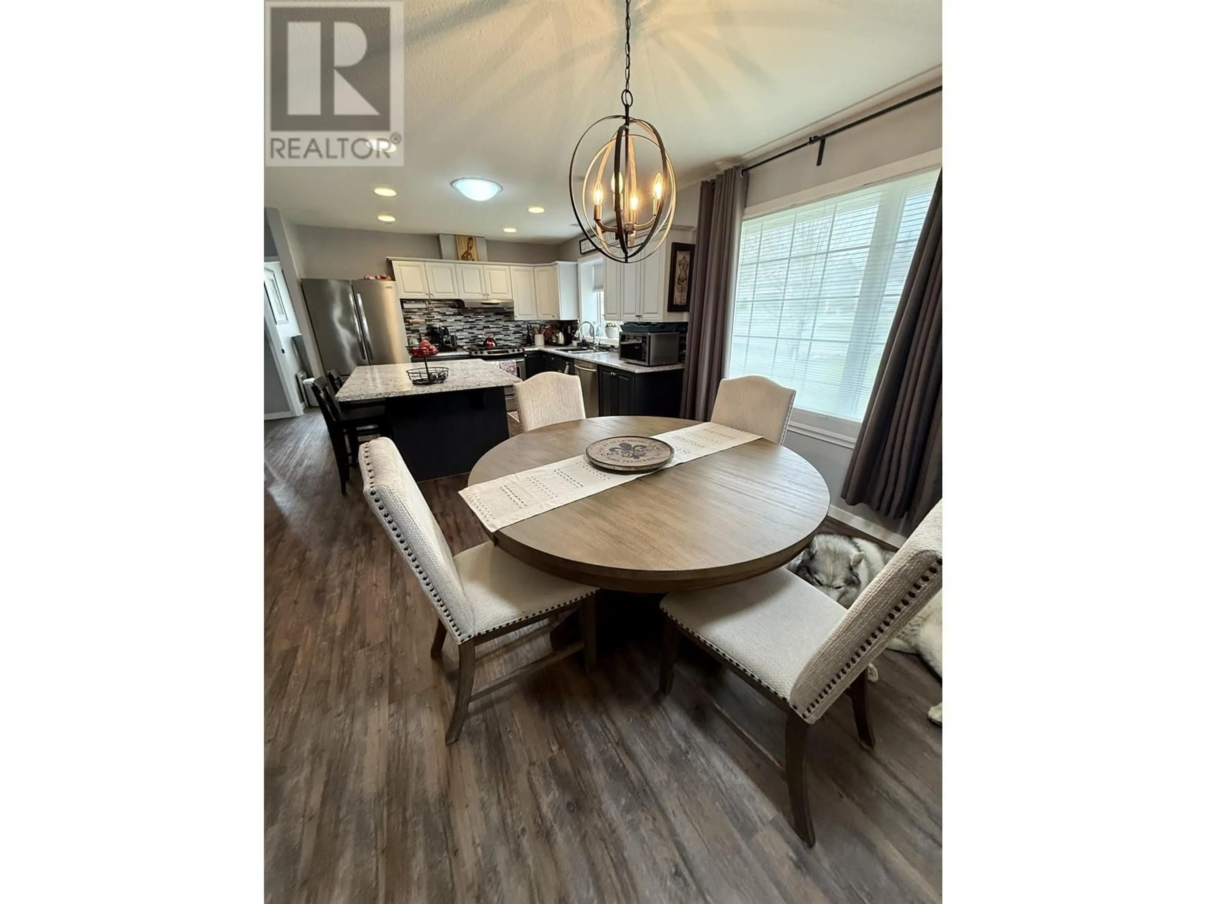 Open concept kitchen, wood/laminate floor for 6242 KELLY ROAD, Prince George British Columbia V2K2G6
