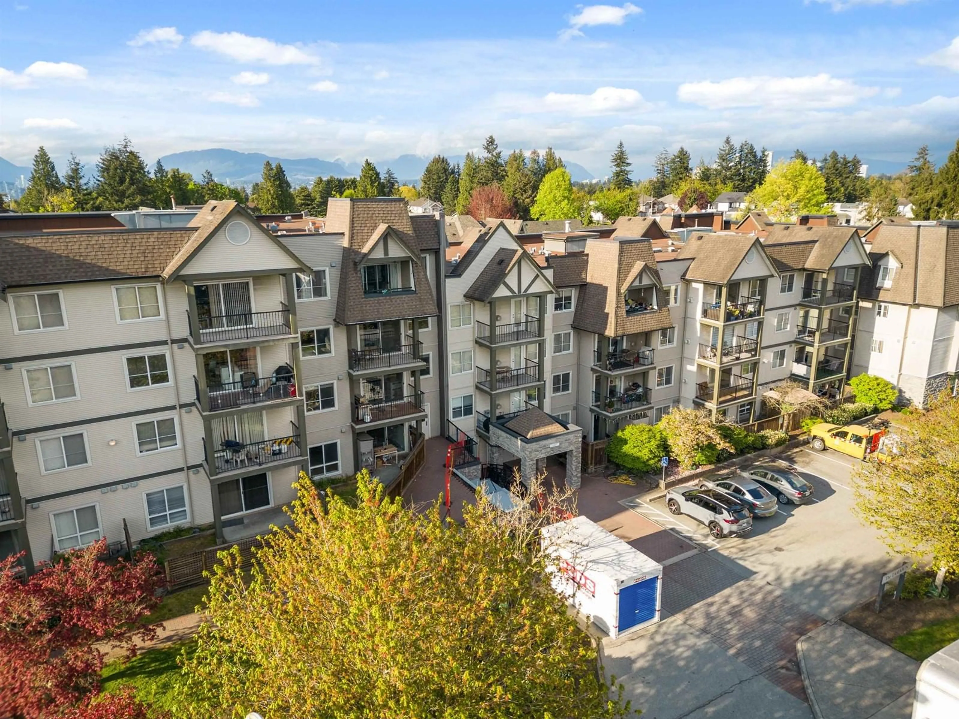 A pic from outside/outdoor area/front of a property/back of a property/a pic from drone, mountain view for 301 - 12083 92A, Surrey British Columbia V3V8C8