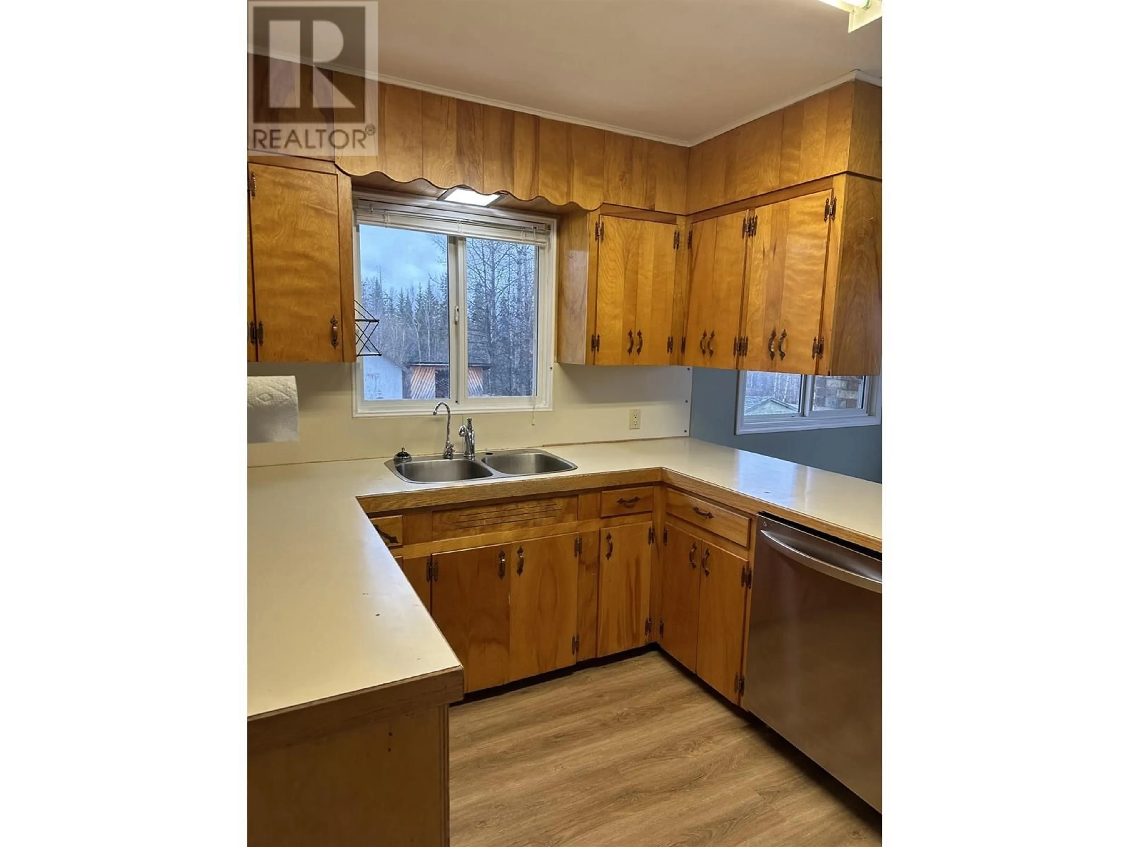 Standard kitchen, wood/laminate floor for 300 8TH AVENUE, Burns Lake British Columbia V0J1E0
