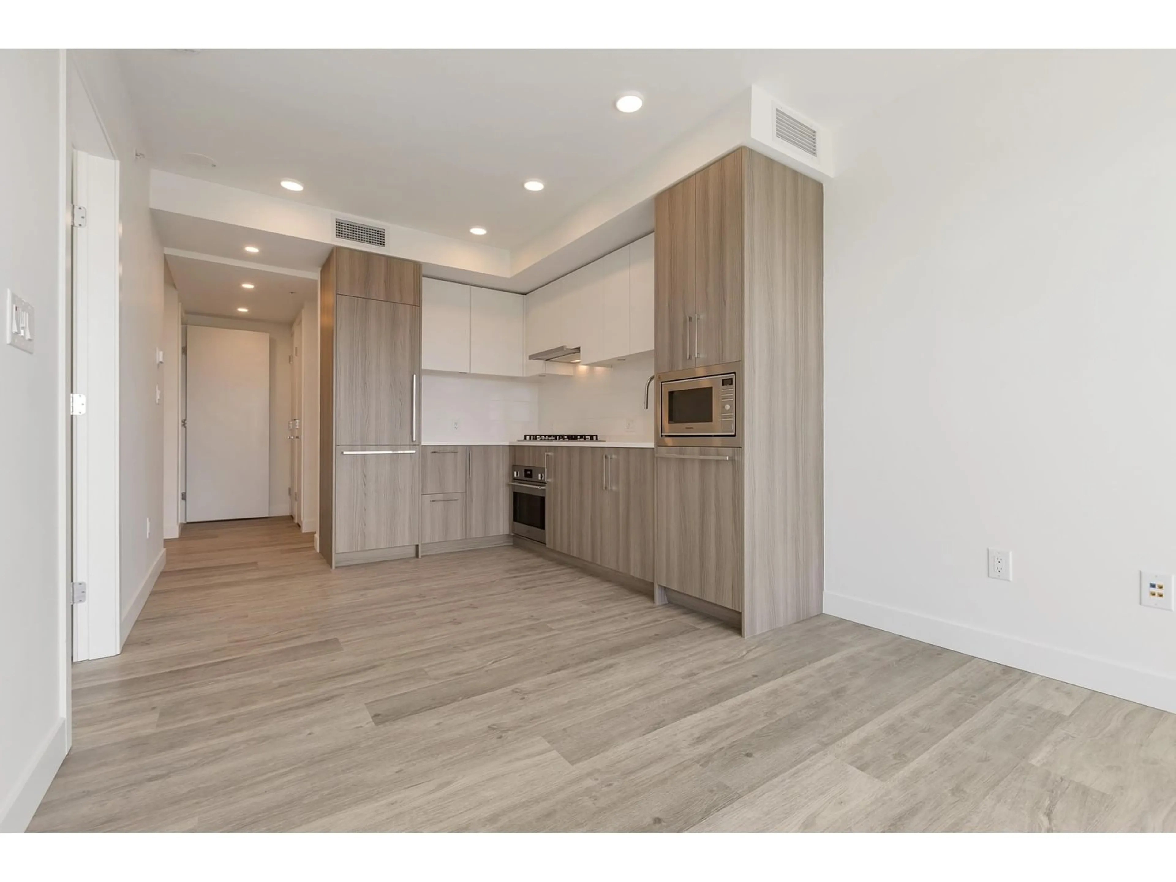 Open concept kitchen, wood/laminate floor for 1301 - 9675 KING GEORGE, Surrey British Columbia V3T0T7
