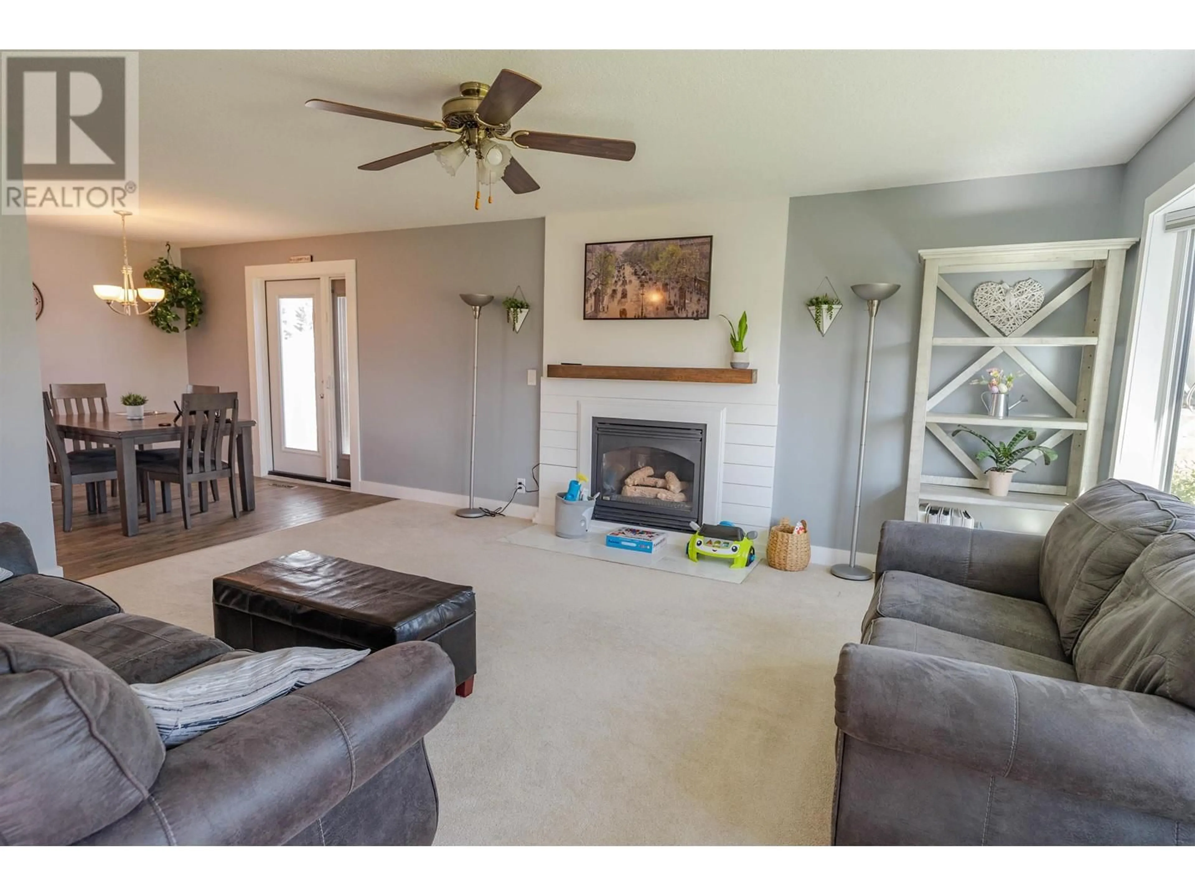 Living room with furniture, unknown for 8912 115 AVENUE, Fort St. John British Columbia V1J2X7