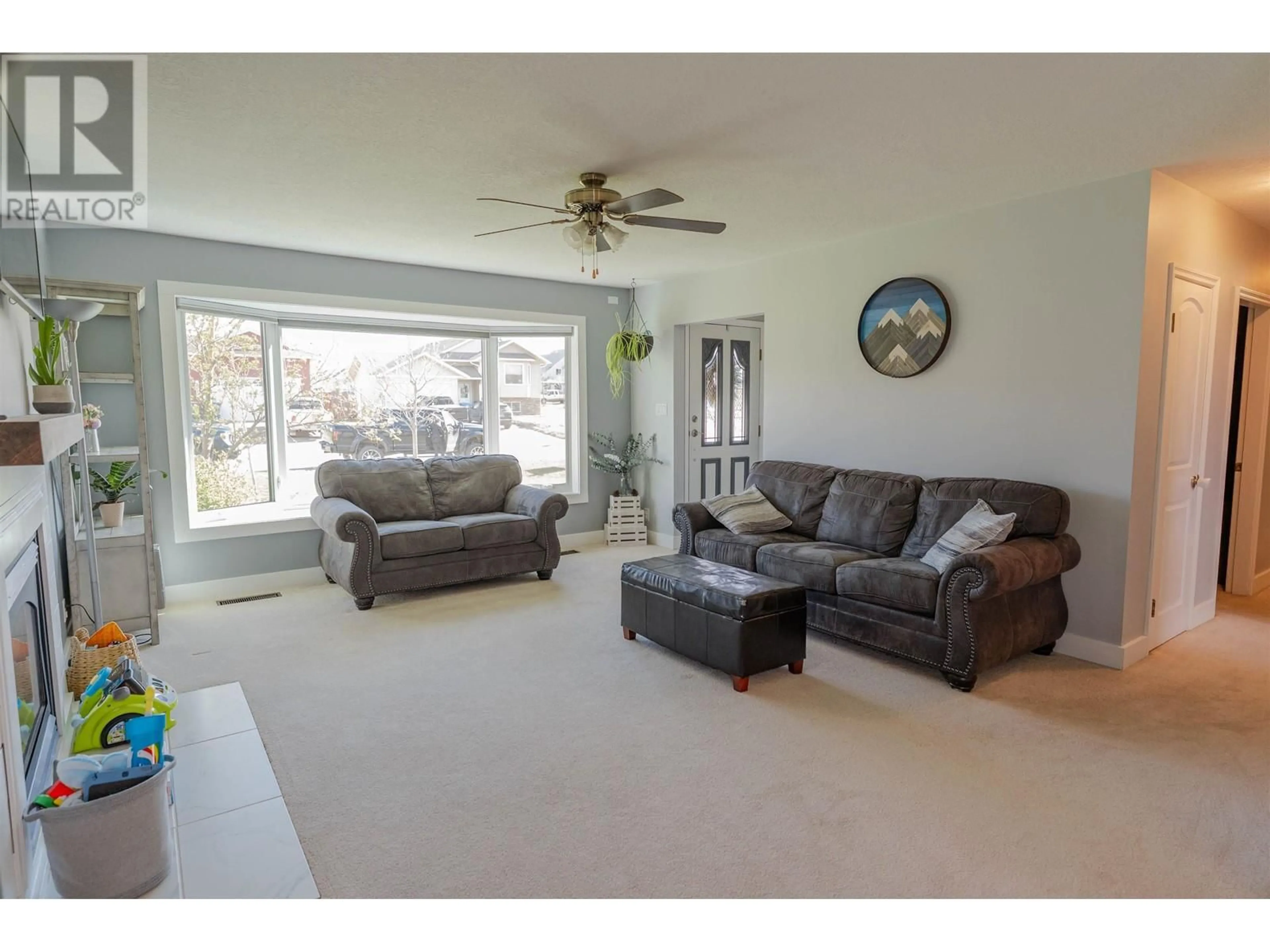 Living room with furniture, unknown for 8912 115 AVENUE, Fort St. John British Columbia V1J2X7