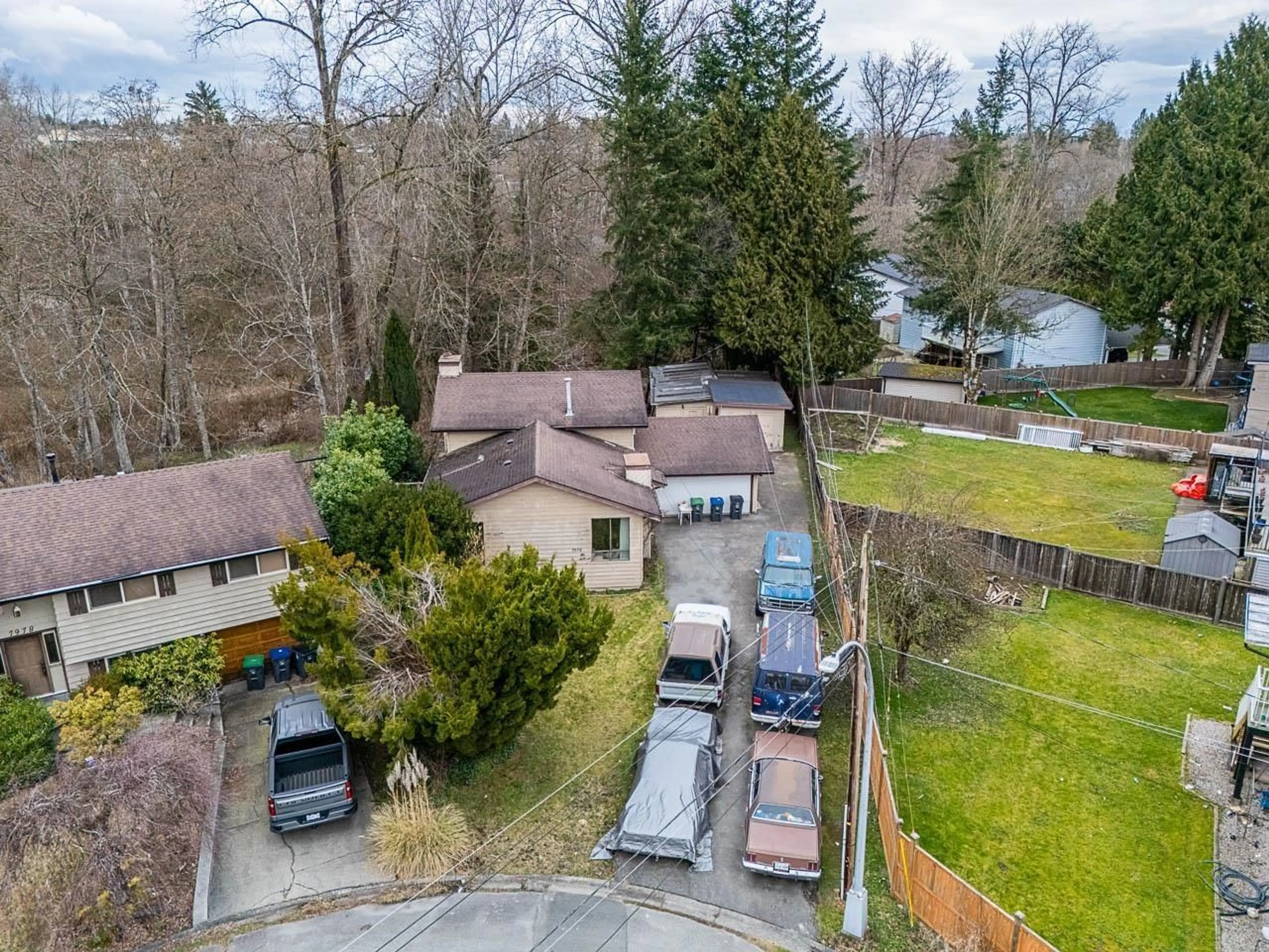 A pic from outside/outdoor area/front of a property/back of a property/a pic from drone, unknown for 7976 141A, Surrey British Columbia V3W6L6
