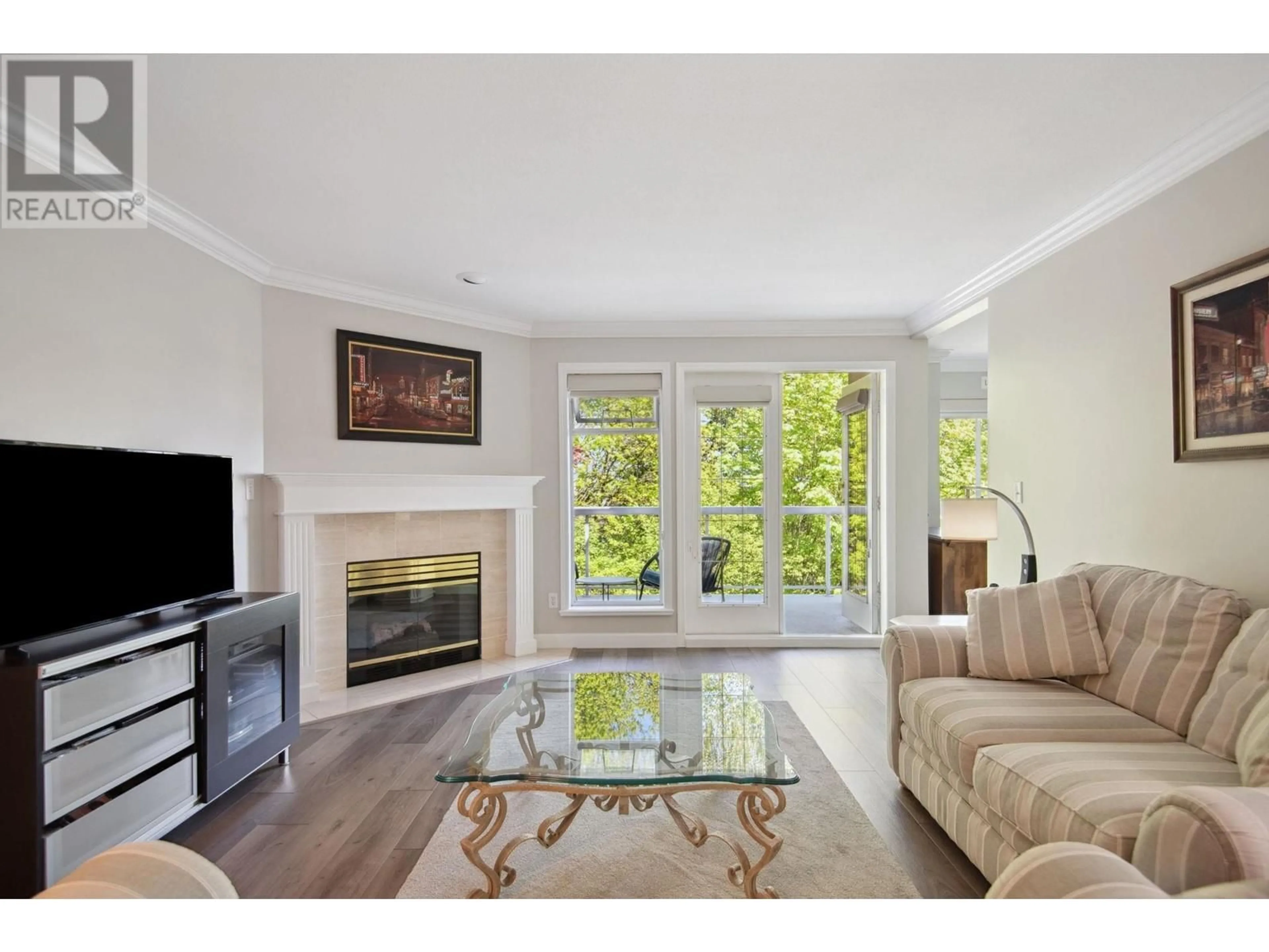 Living room with furniture, wood/laminate floor for 28 - 72 JAMIESON COURT, New Westminster British Columbia V3L5R6