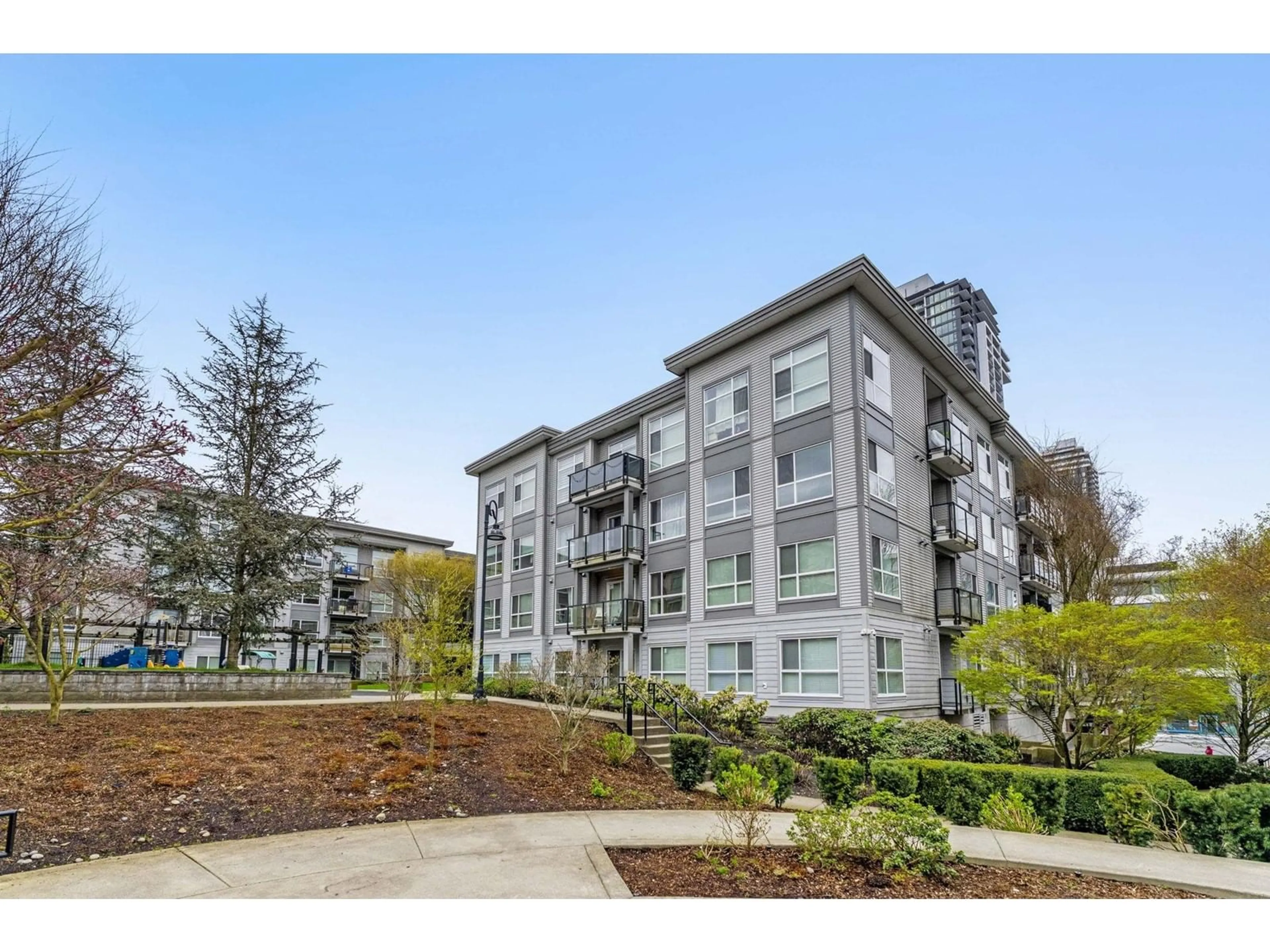 A pic from outside/outdoor area/front of a property/back of a property/a pic from drone, unknown for 425 - 13733 107A, Surrey British Columbia V3T0B7