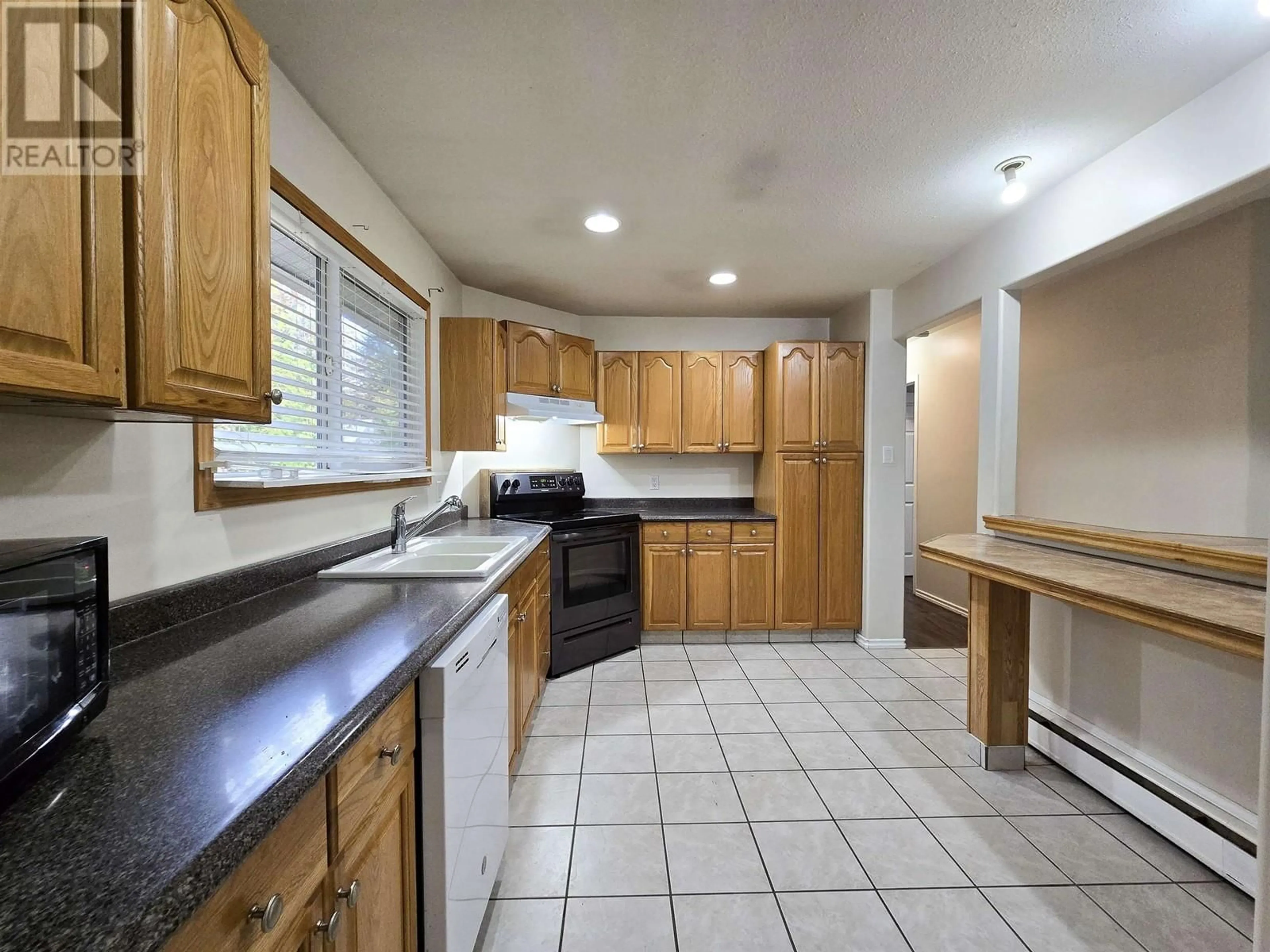 Standard kitchen, ceramic/tile floor for 69 CAPILANO STREET, Kitimat British Columbia V8C1X7