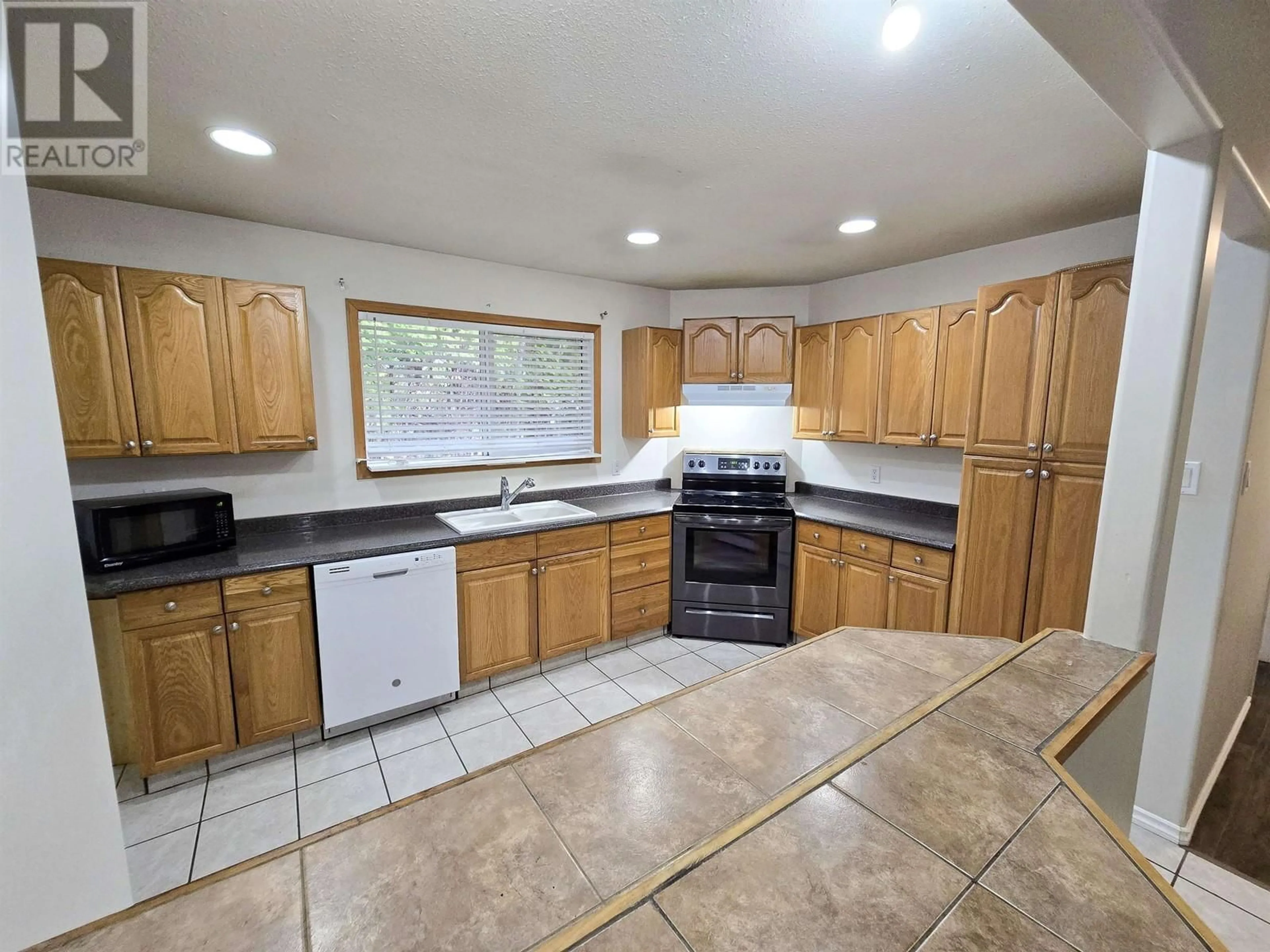 Standard kitchen, ceramic/tile floor for 69 CAPILANO STREET, Kitimat British Columbia V8C1X7