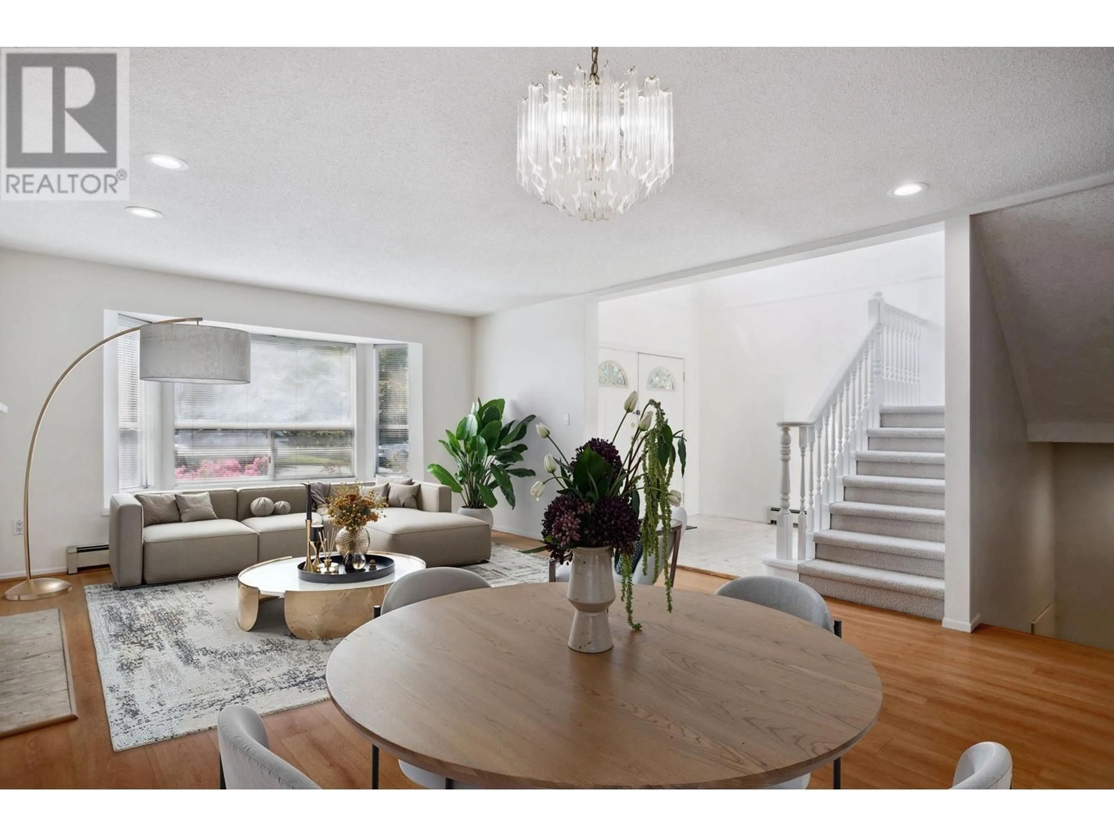 Living room with furniture, wood/laminate floor for 3233 GRAVELEY STREET, Vancouver British Columbia V5K3K8