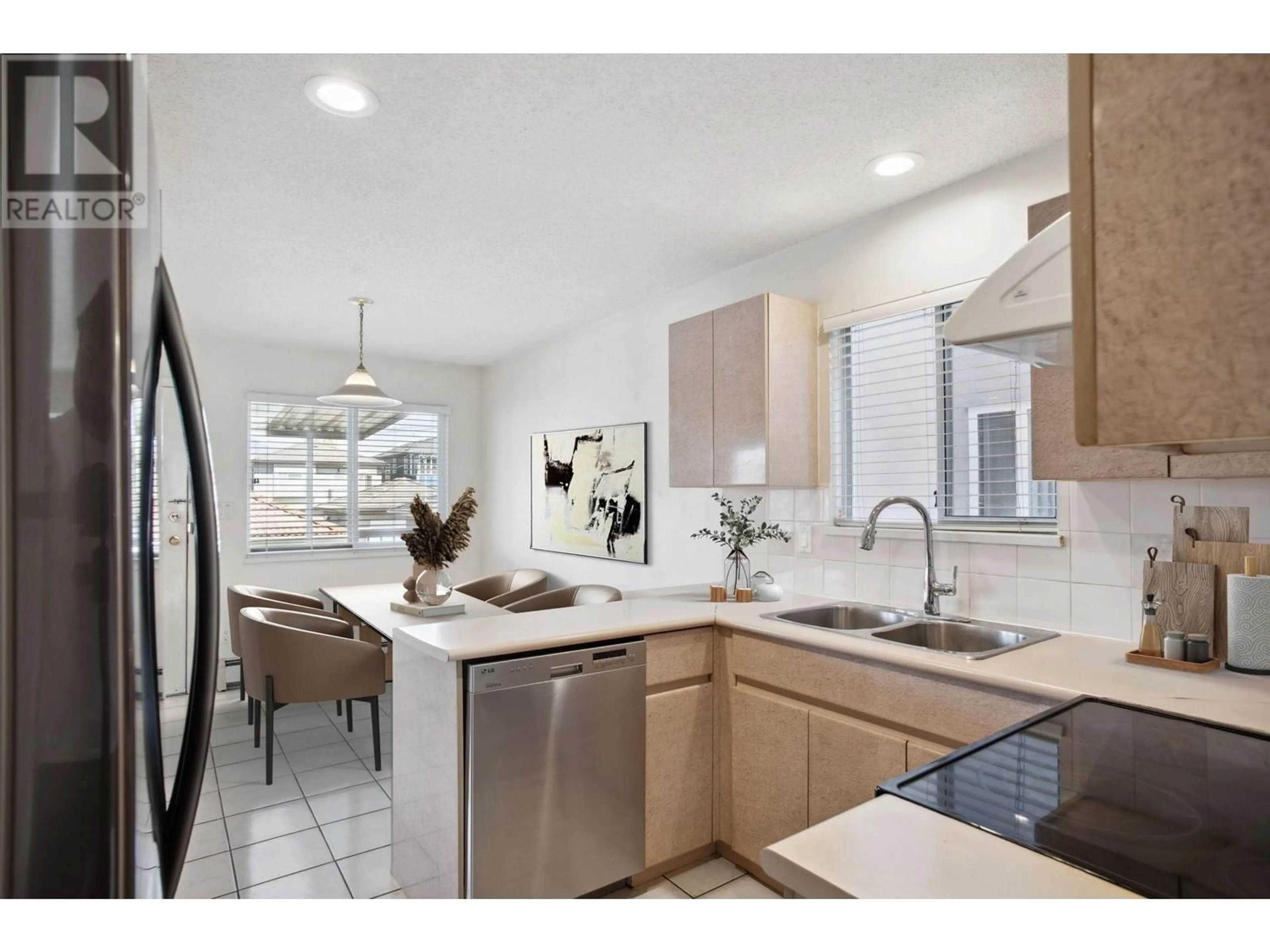 Contemporary kitchen, ceramic/tile floor for 3233 GRAVELEY STREET, Vancouver British Columbia V5K3K8