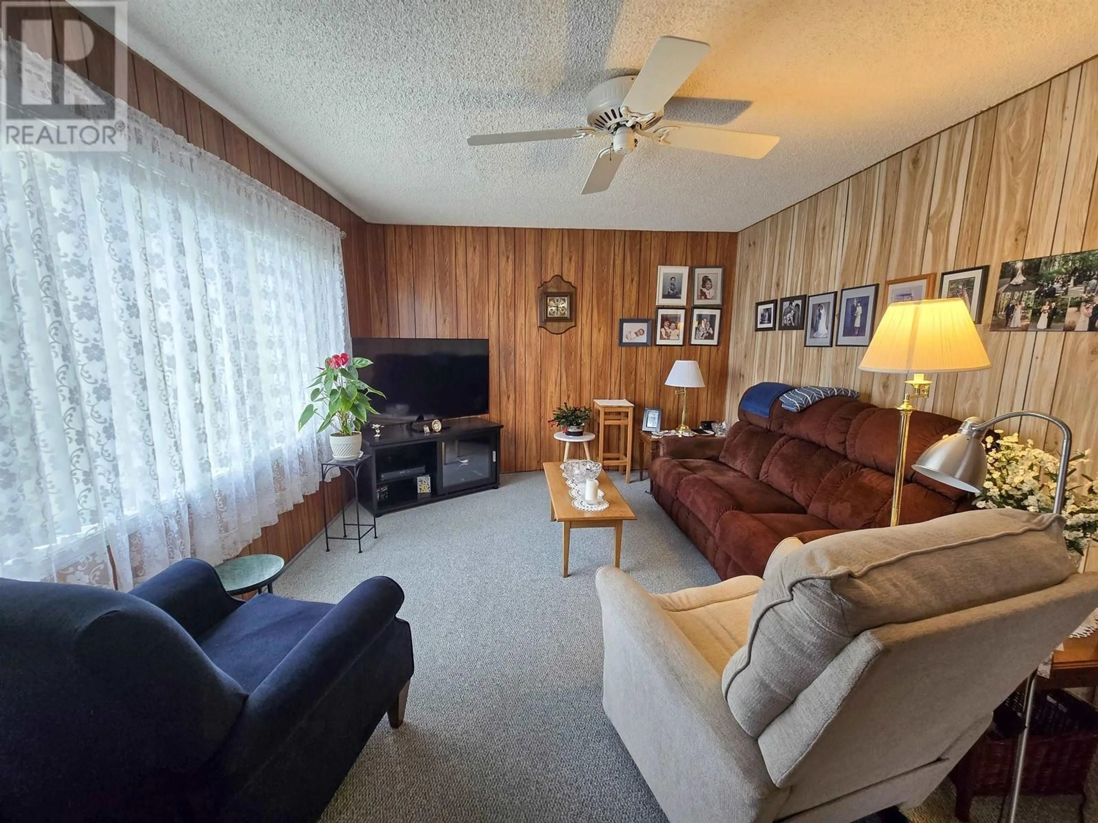 Living room with furniture, wood/laminate floor for 81 MALLARD STREET, Kitimat British Columbia V8C1N2