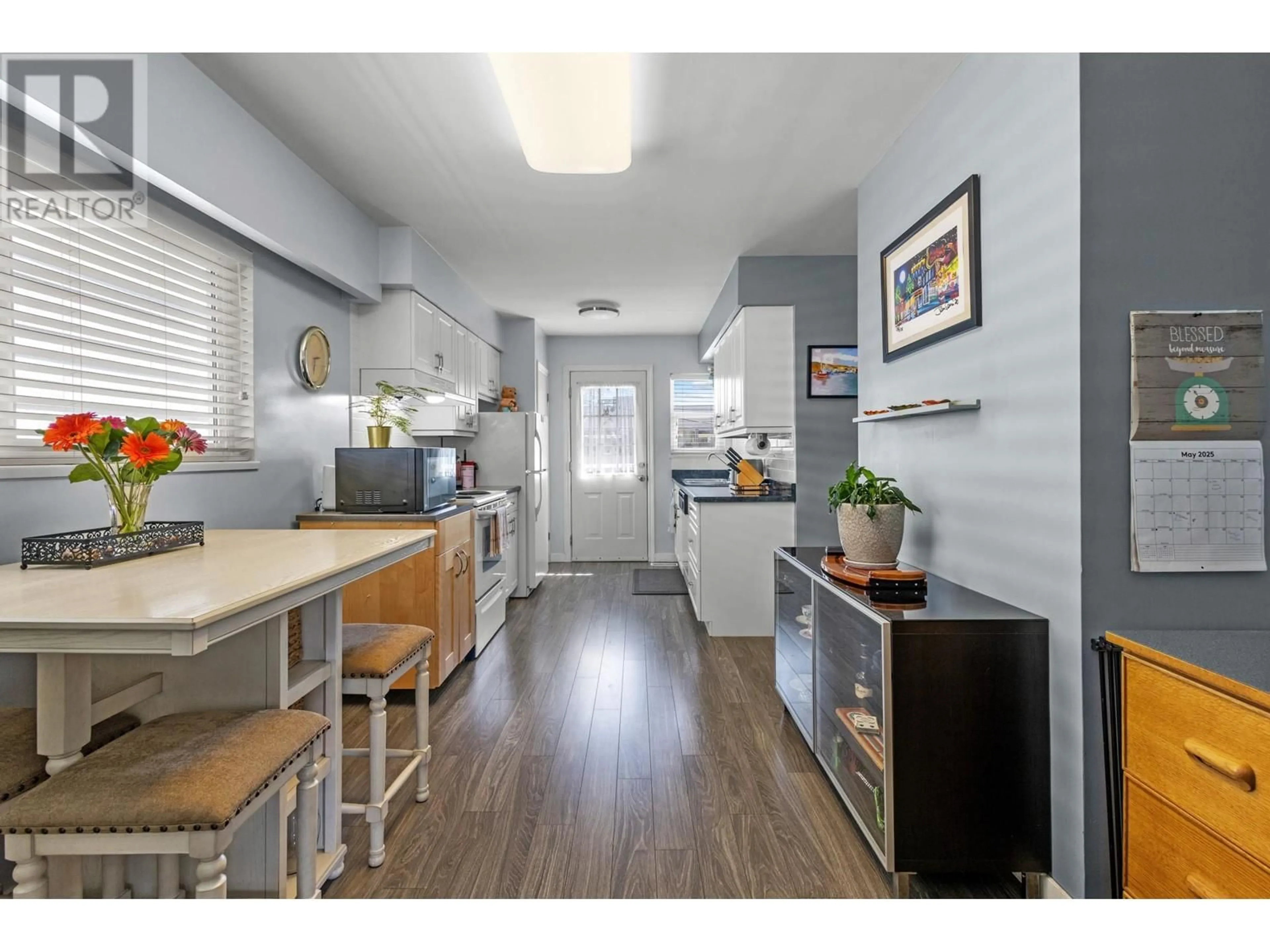 Open concept kitchen, wood/laminate floor for 4830a ALBERT STREET, Burnaby British Columbia V5C2H3