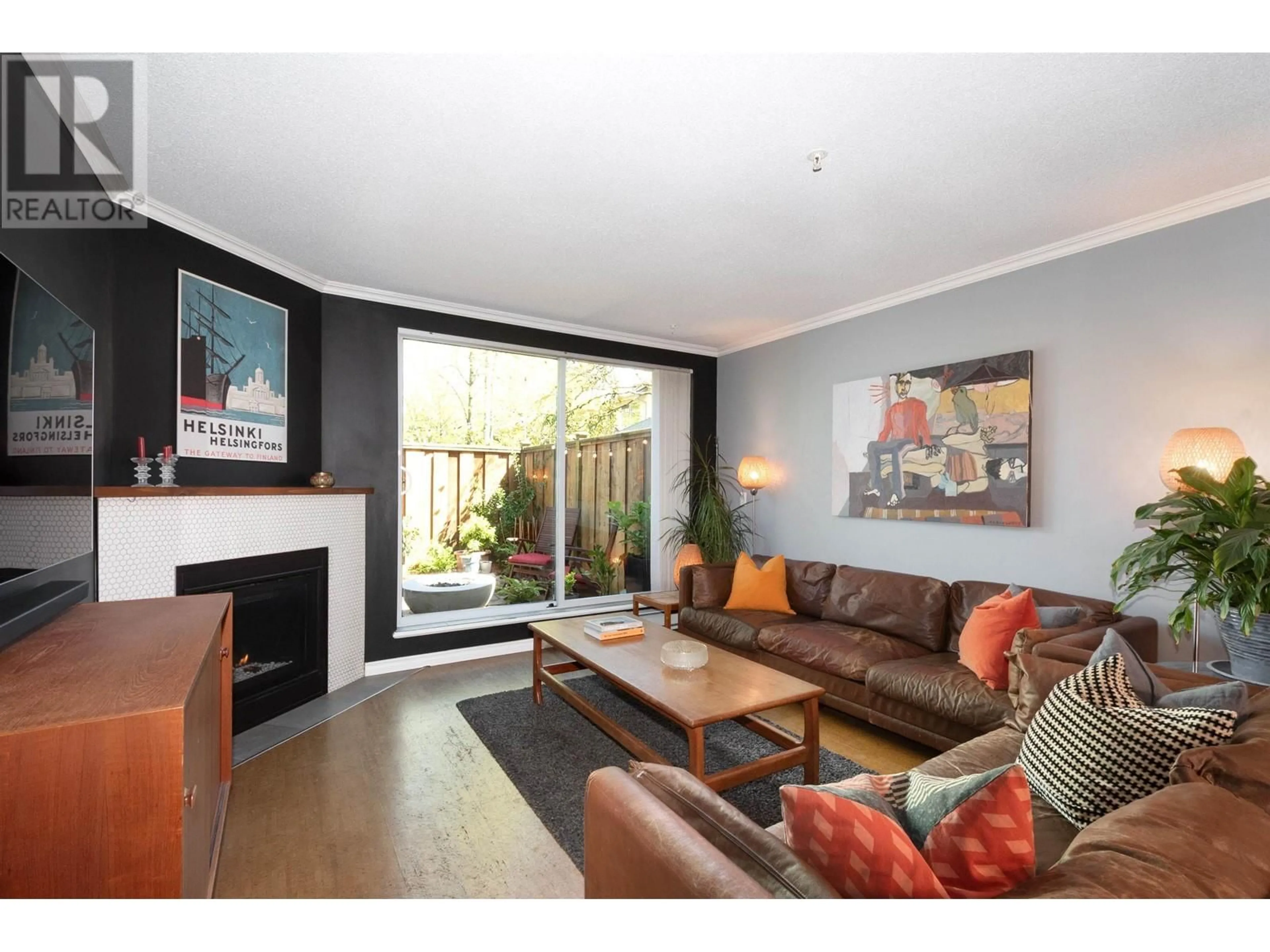 Living room with furniture, wood/laminate floor for 33 - 3439 TERRA VITA PLACE, Vancouver British Columbia V5K5H7