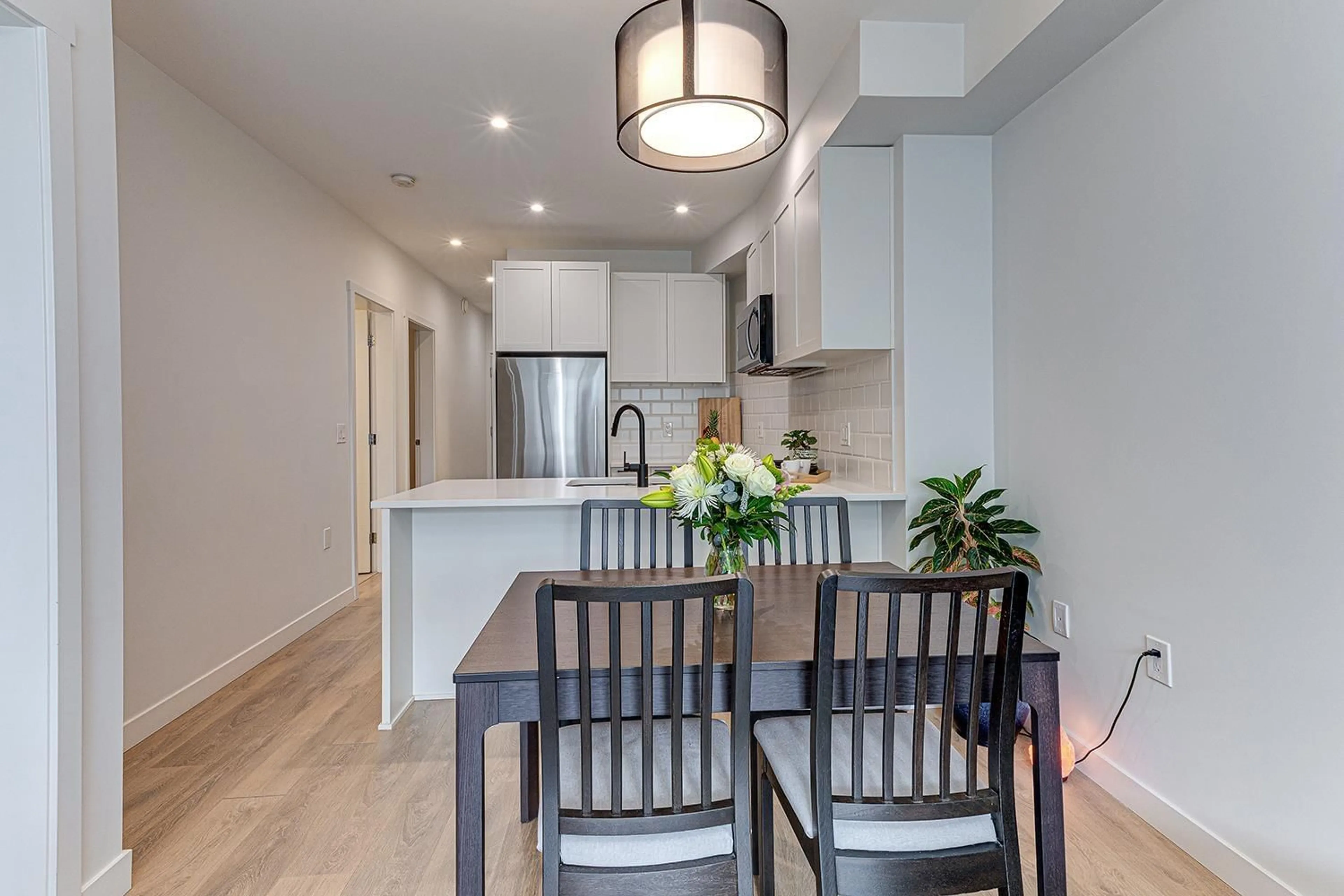 Open concept kitchen, wood/laminate floor for 302 - 5415 BRYDON, Langley British Columbia V3A0N4