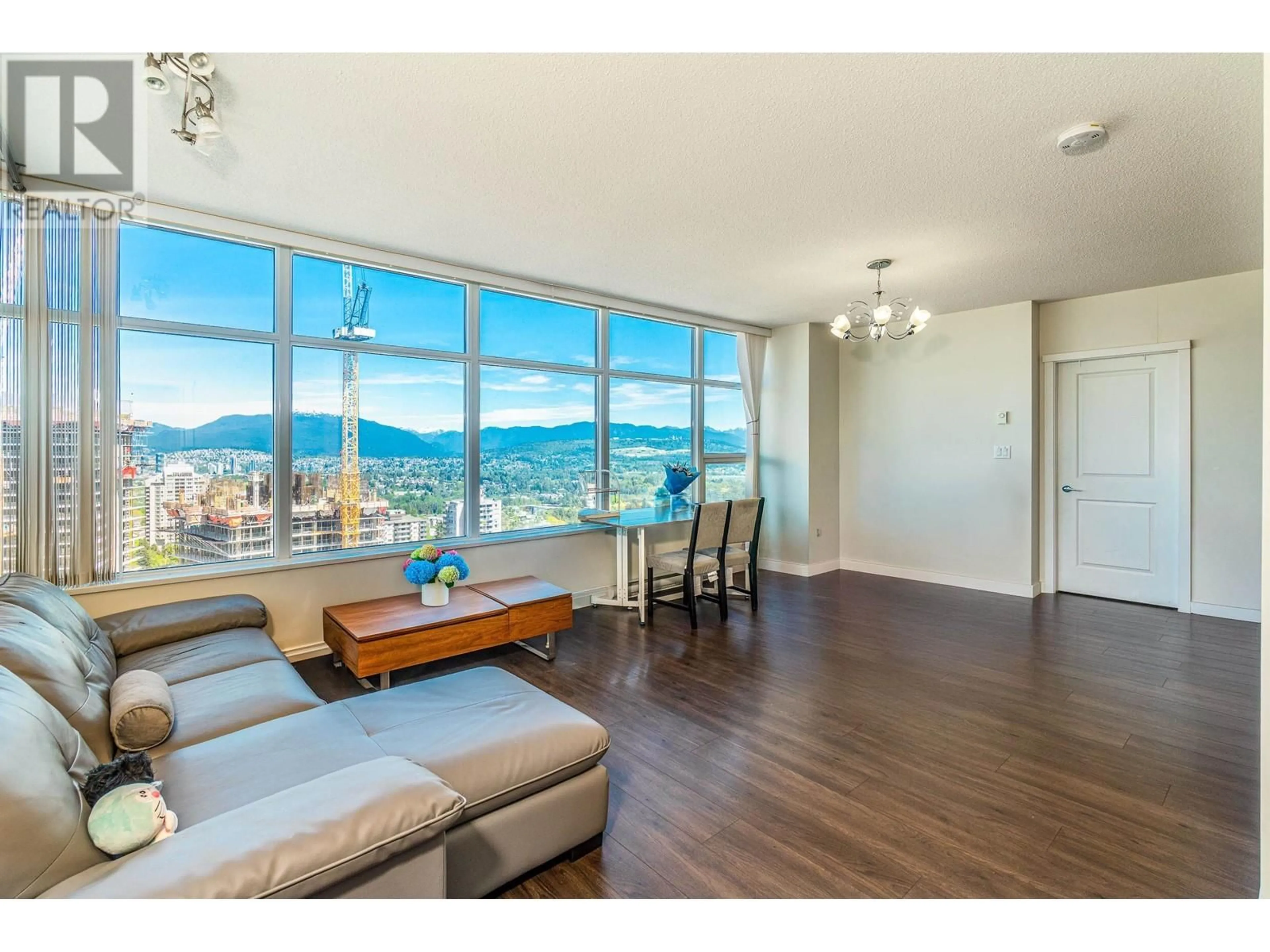 Living room with furniture, wood/laminate floor for 2802 - 4880 BENNETT STREET, Burnaby British Columbia V5H0C1
