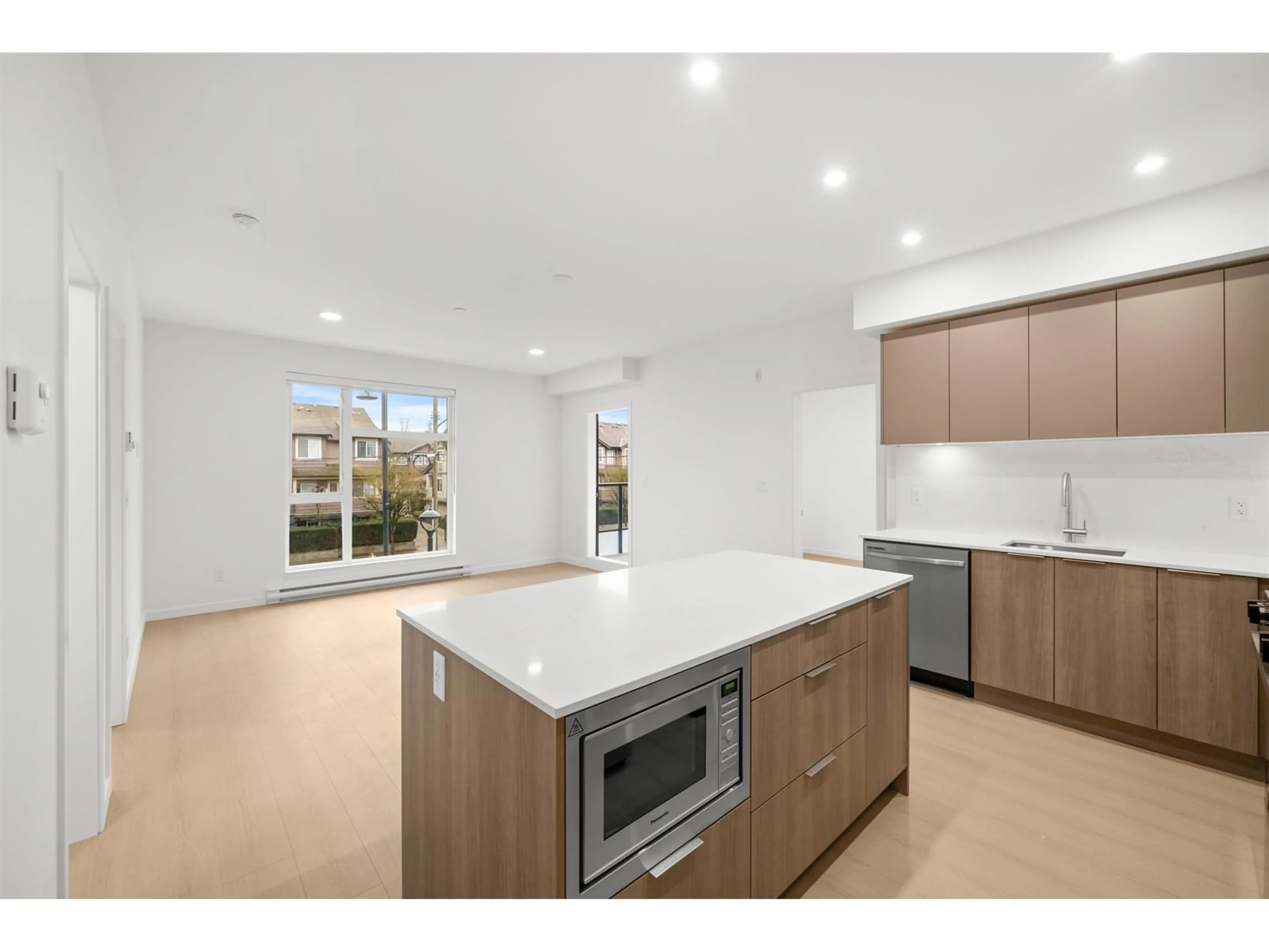 Open concept kitchen, unknown for 211 - 10828 139A, Surrey British Columbia V3R3E5