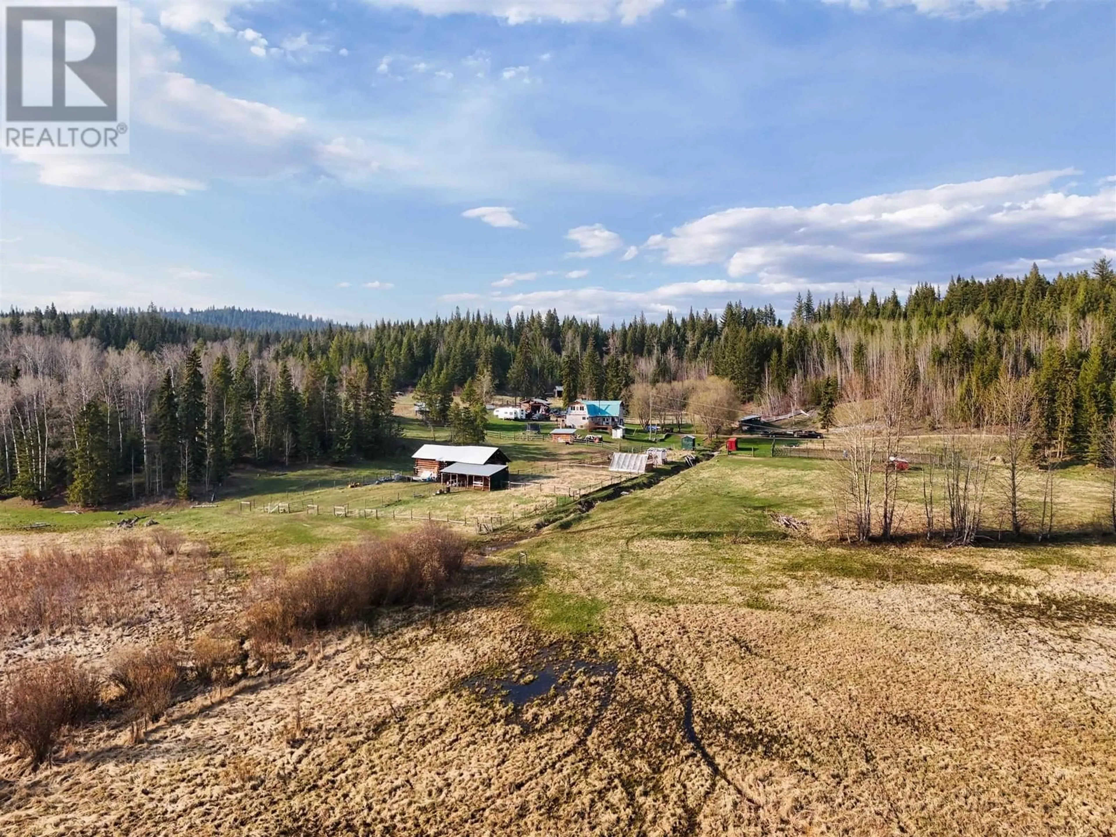 A pic from outside/outdoor area/front of a property/back of a property/a pic from drone, forest/trees view for 4166 NAZKO ROAD, Quesnel British Columbia V2J7G3