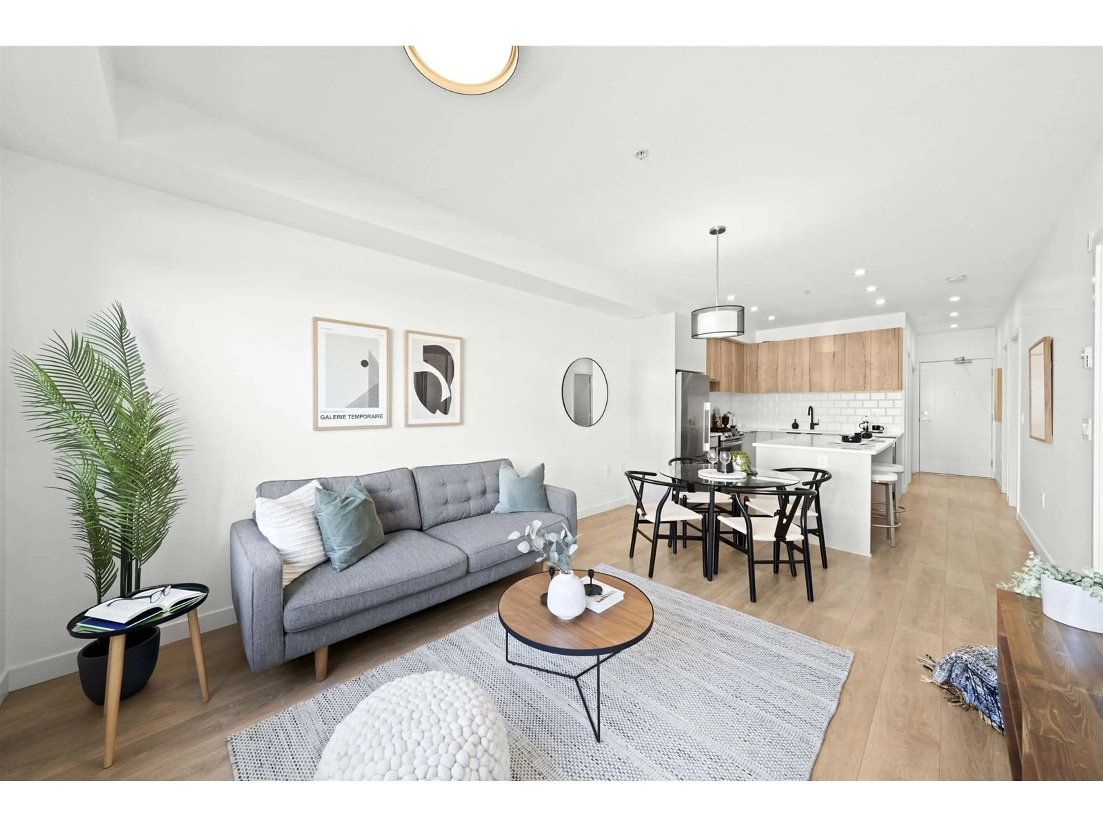 Living room with furniture, wood/laminate floor for 229 - 5415 BRYDON, Langley British Columbia V3A0N4