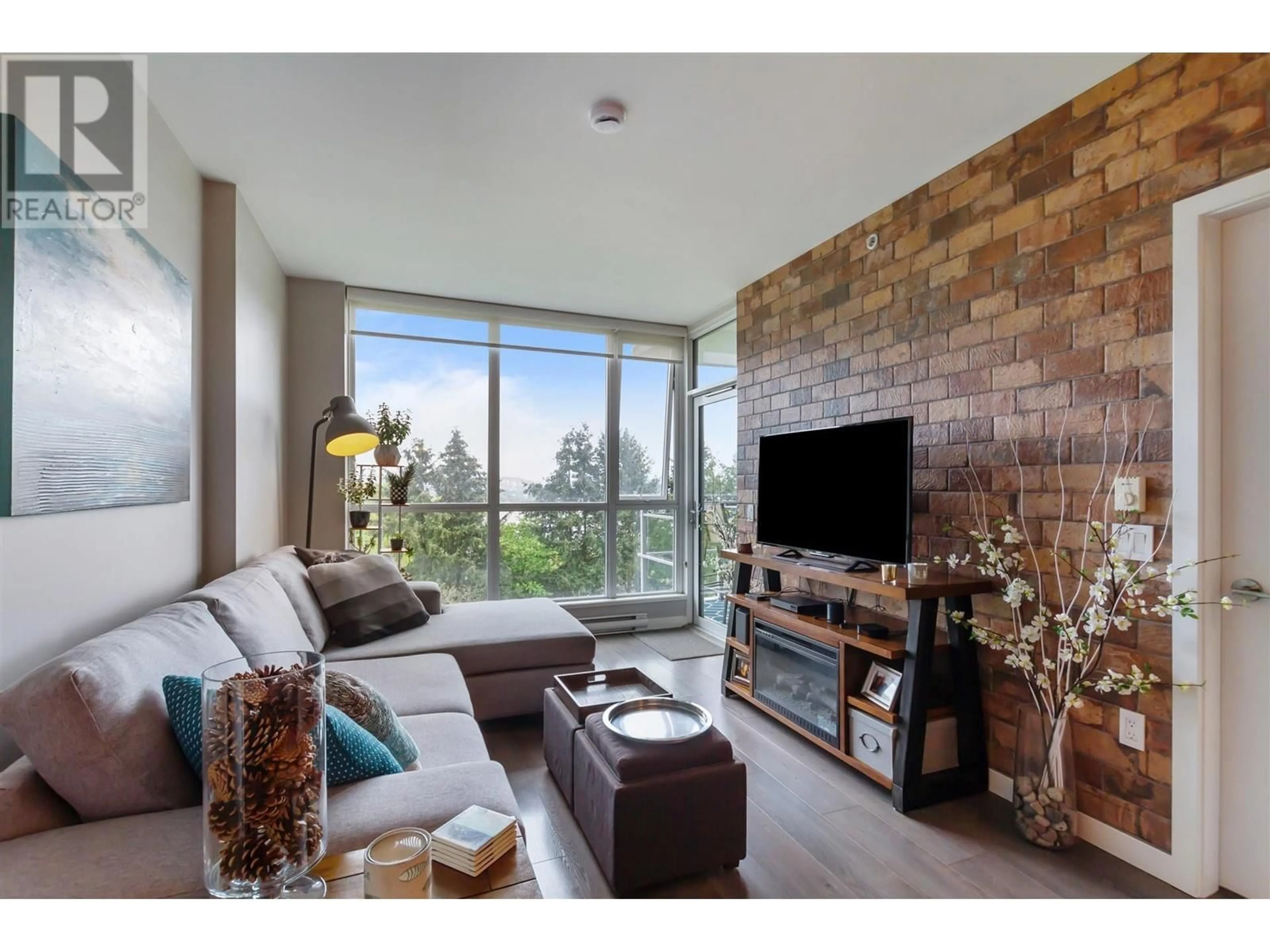 Living room with furniture, unknown for 701 - 271 FRANCIS WAY, New Westminster British Columbia V3L0H2