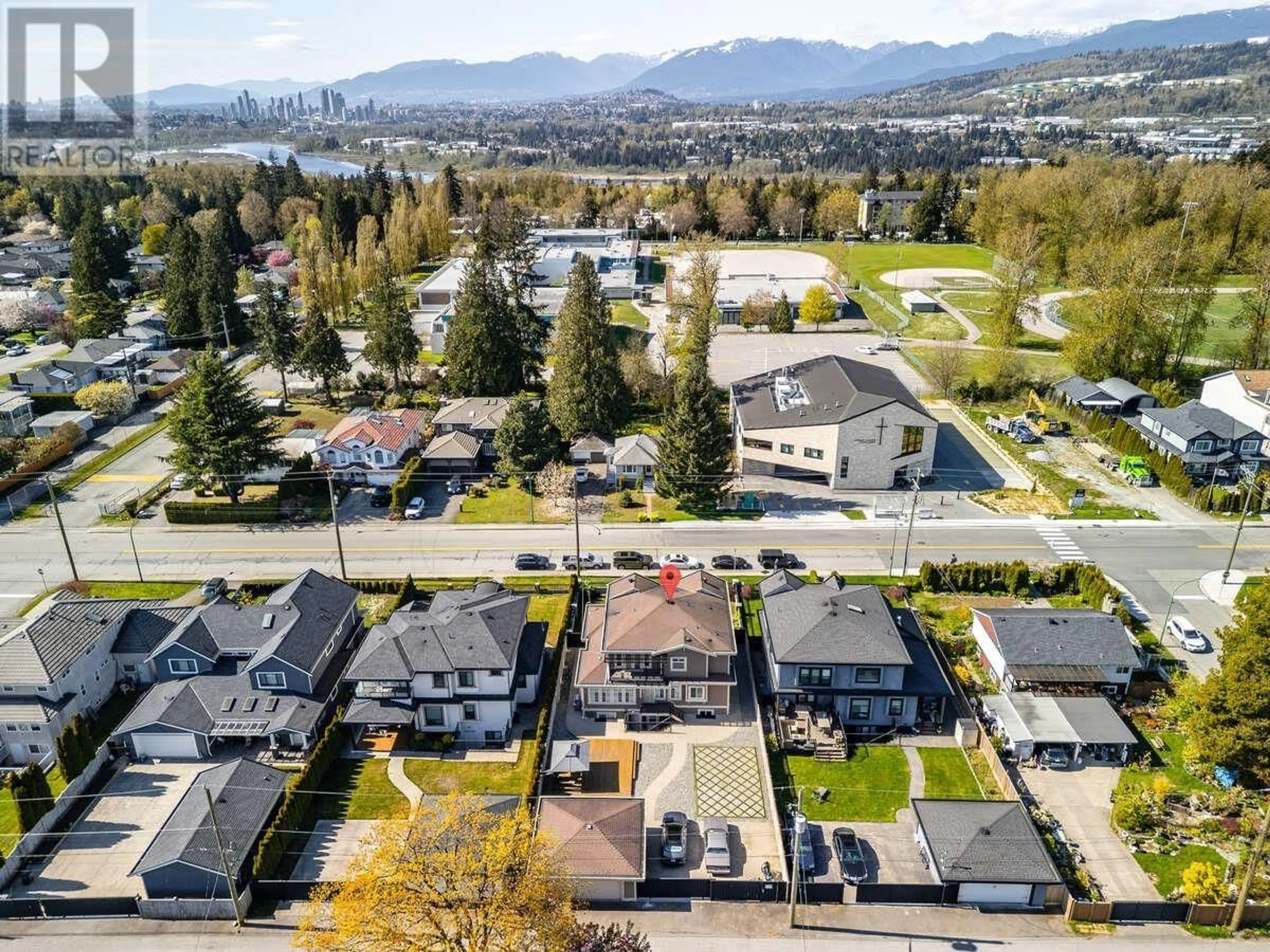 A pic from outside/outdoor area/front of a property/back of a property/a pic from drone, mountain view for 8588 ARMSTRONG AVENUE, Burnaby British Columbia V3N2H5