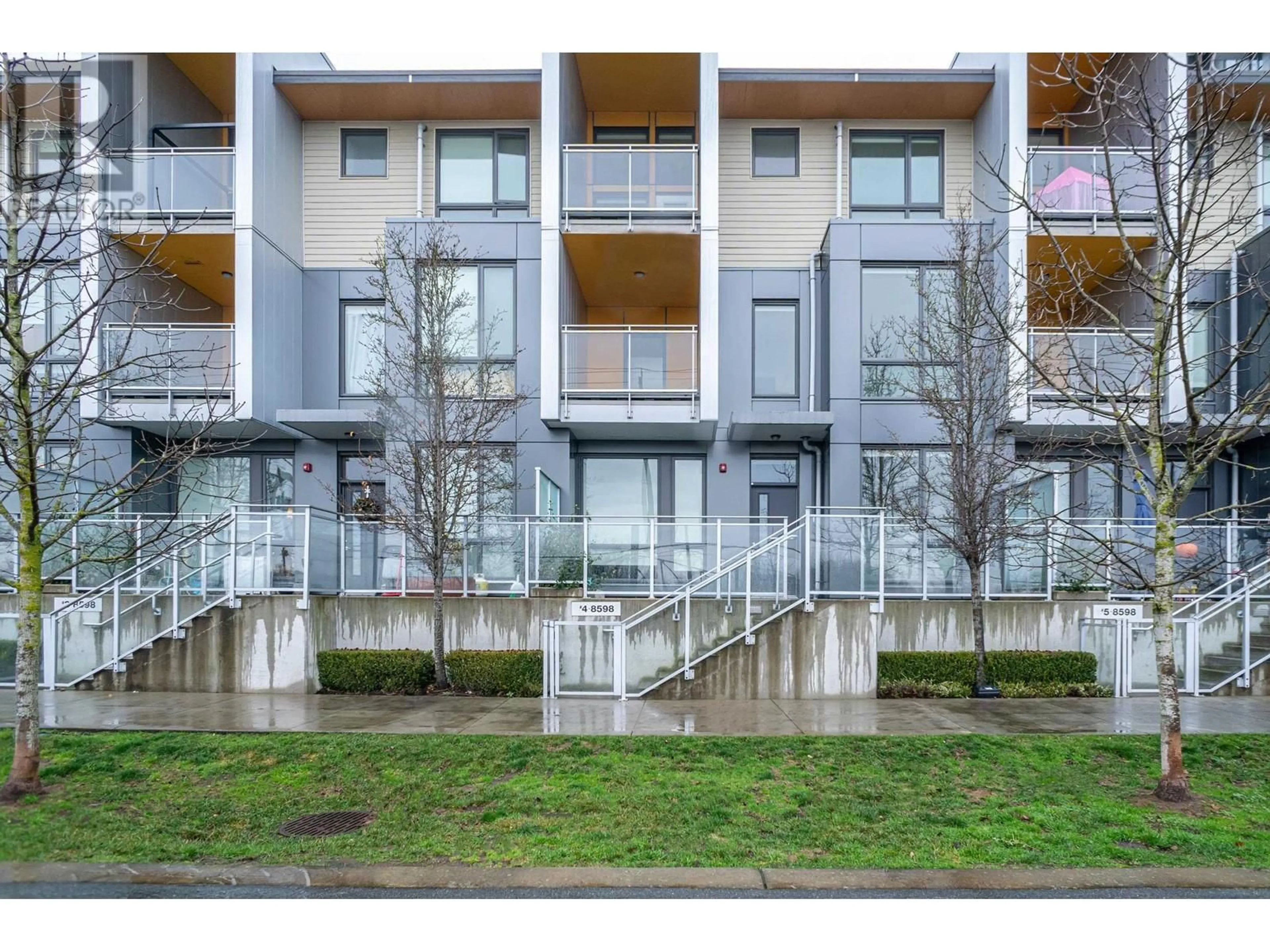 A pic from outside/outdoor area/front of a property/back of a property/a pic from drone, street for 4 - 8598 RIVER DISTRICT CROSSING, Vancouver British Columbia V5S0C1