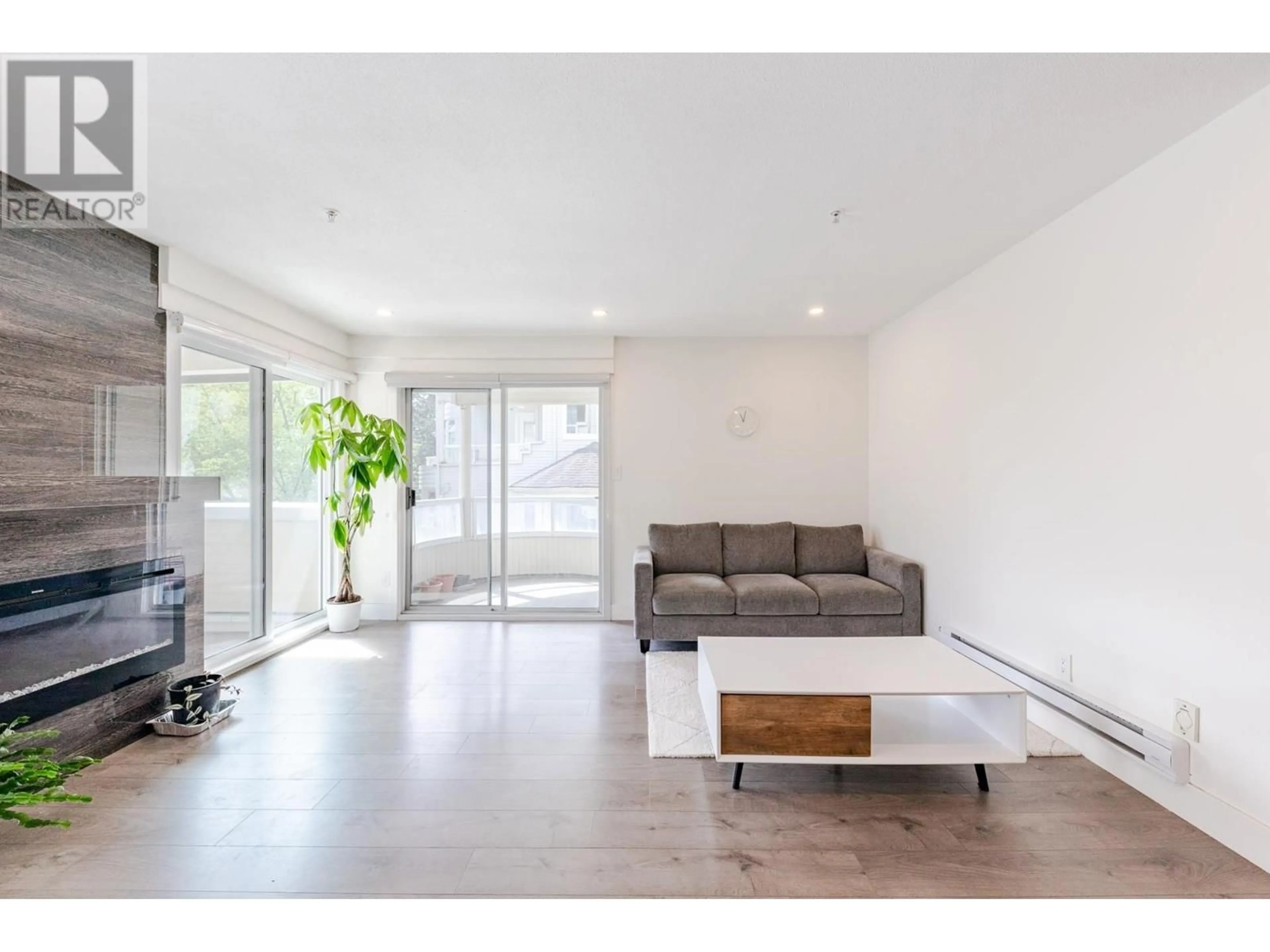 Living room with furniture, unknown for 208 - 7620 COLUMBIA STREET, Vancouver British Columbia V5X4S8