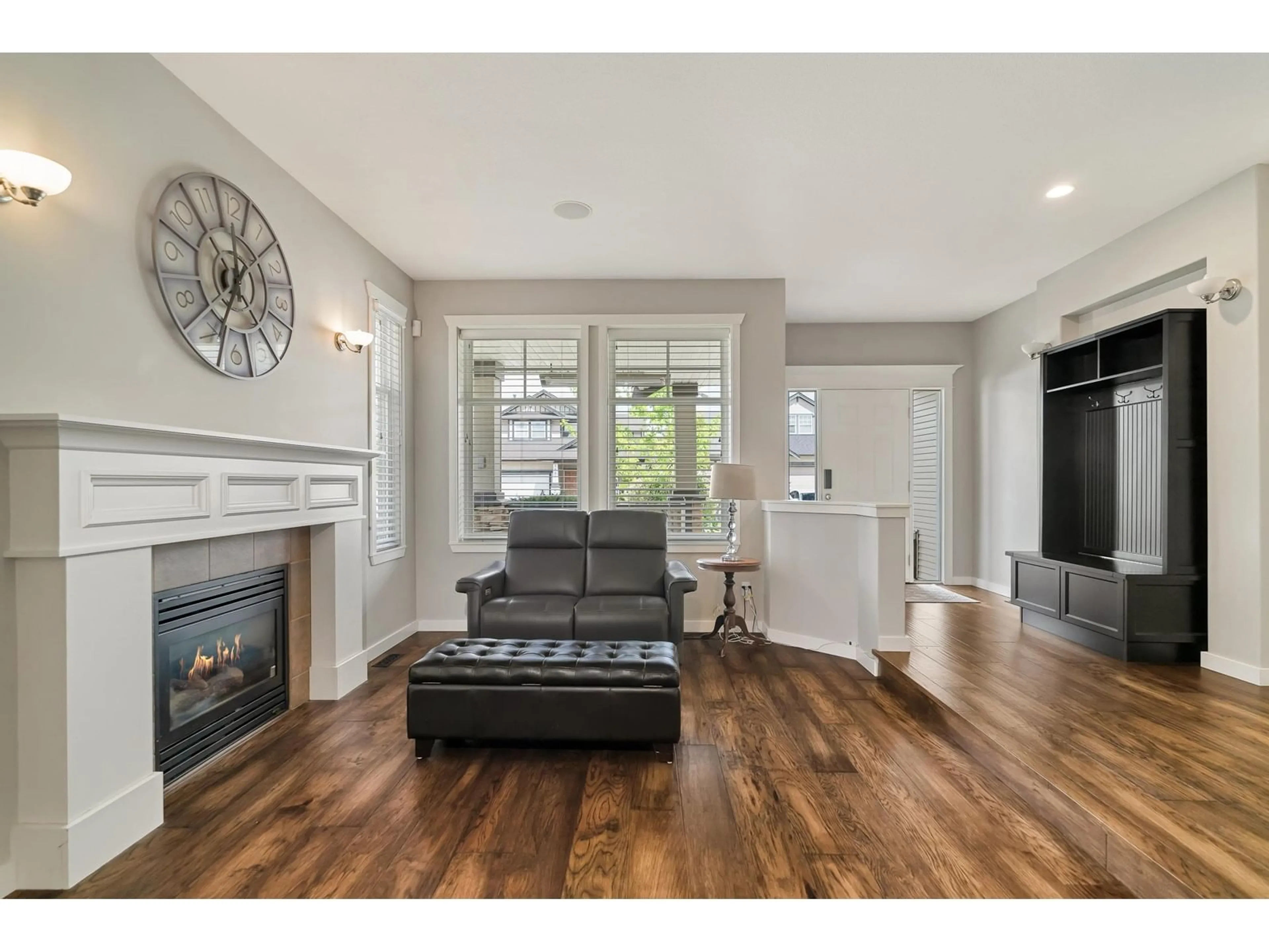 Living room with furniture, wood/laminate floor for 18864 69A, Surrey British Columbia V4N5K2
