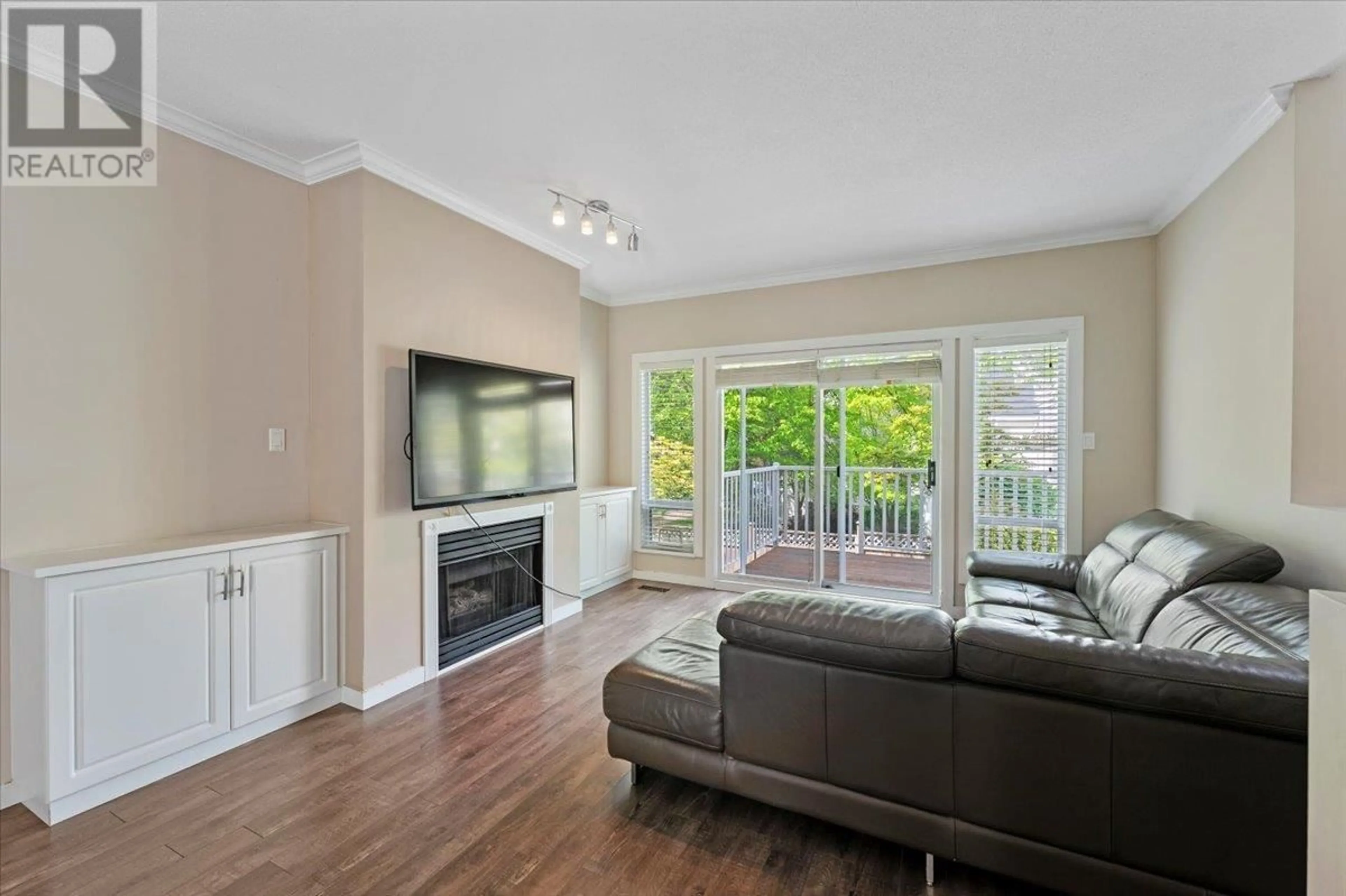 Living room with furniture, wood/laminate floor for 30 - 12871 JACK BELL DRIVE, Richmond British Columbia V6V2T8