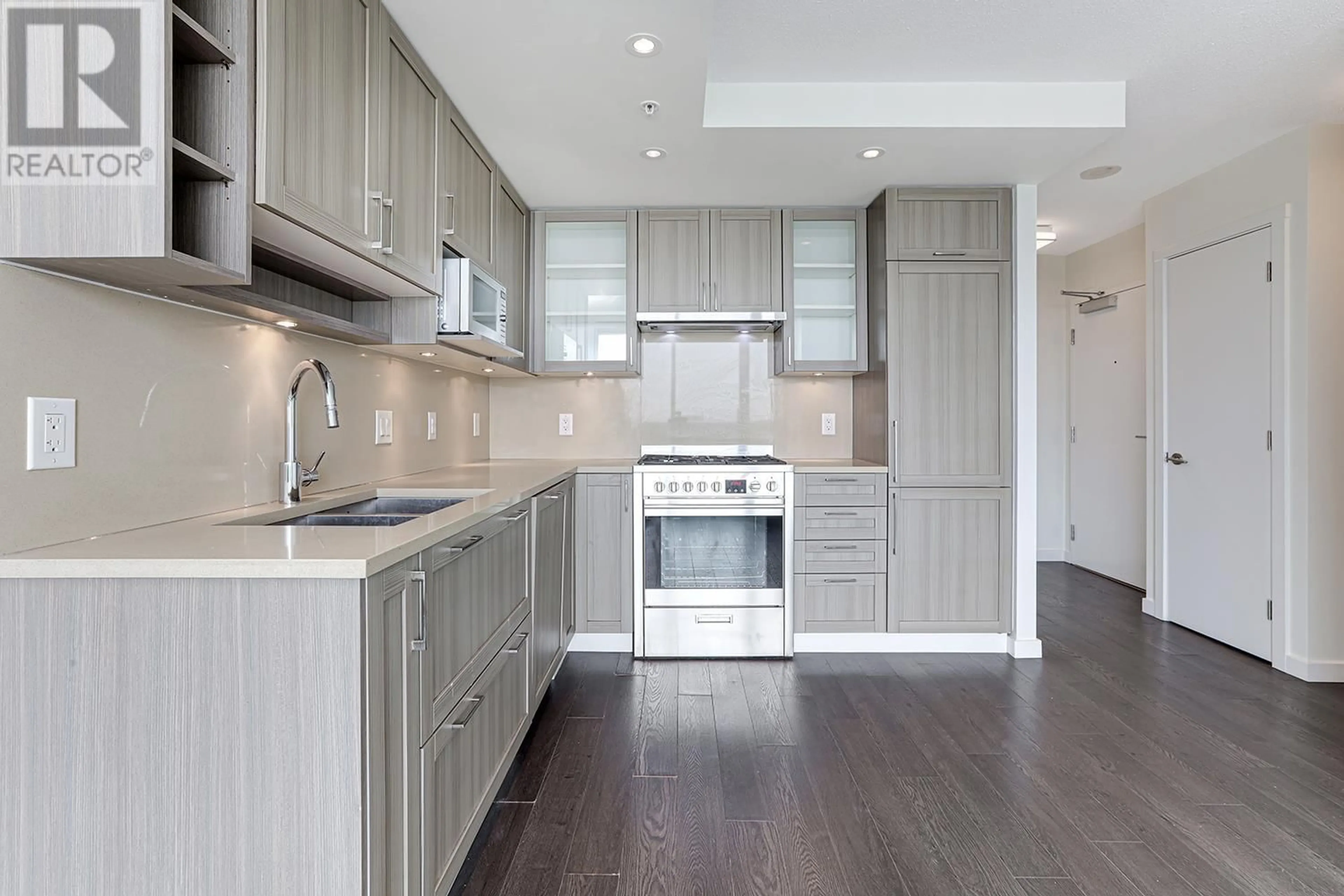 Open concept kitchen, wood/laminate floor for 1510 - 5665 BOUNDARY ROAD, Vancouver British Columbia V5R0E4