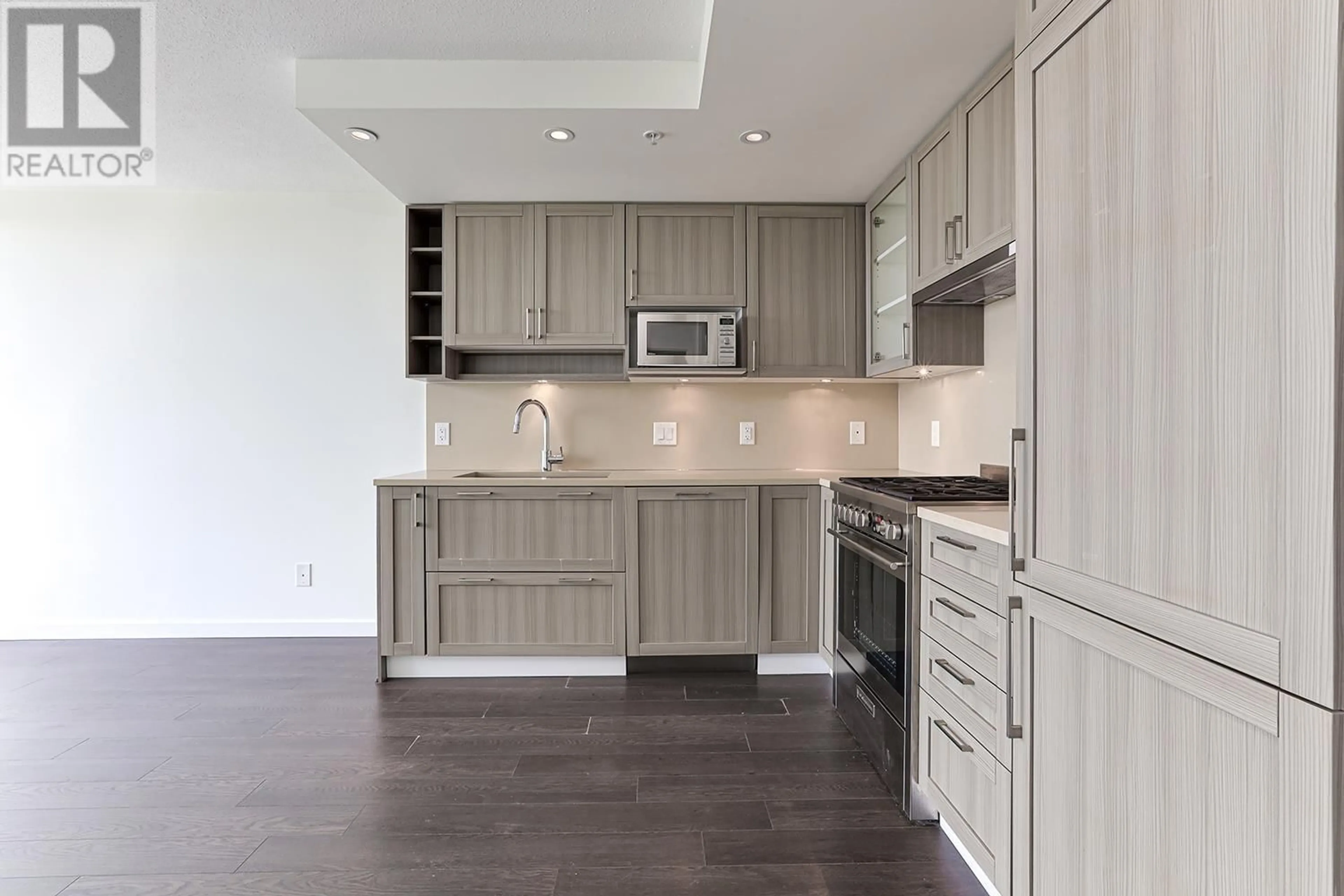 Open concept kitchen, wood/laminate floor for 1510 - 5665 BOUNDARY ROAD, Vancouver British Columbia V5R0E4