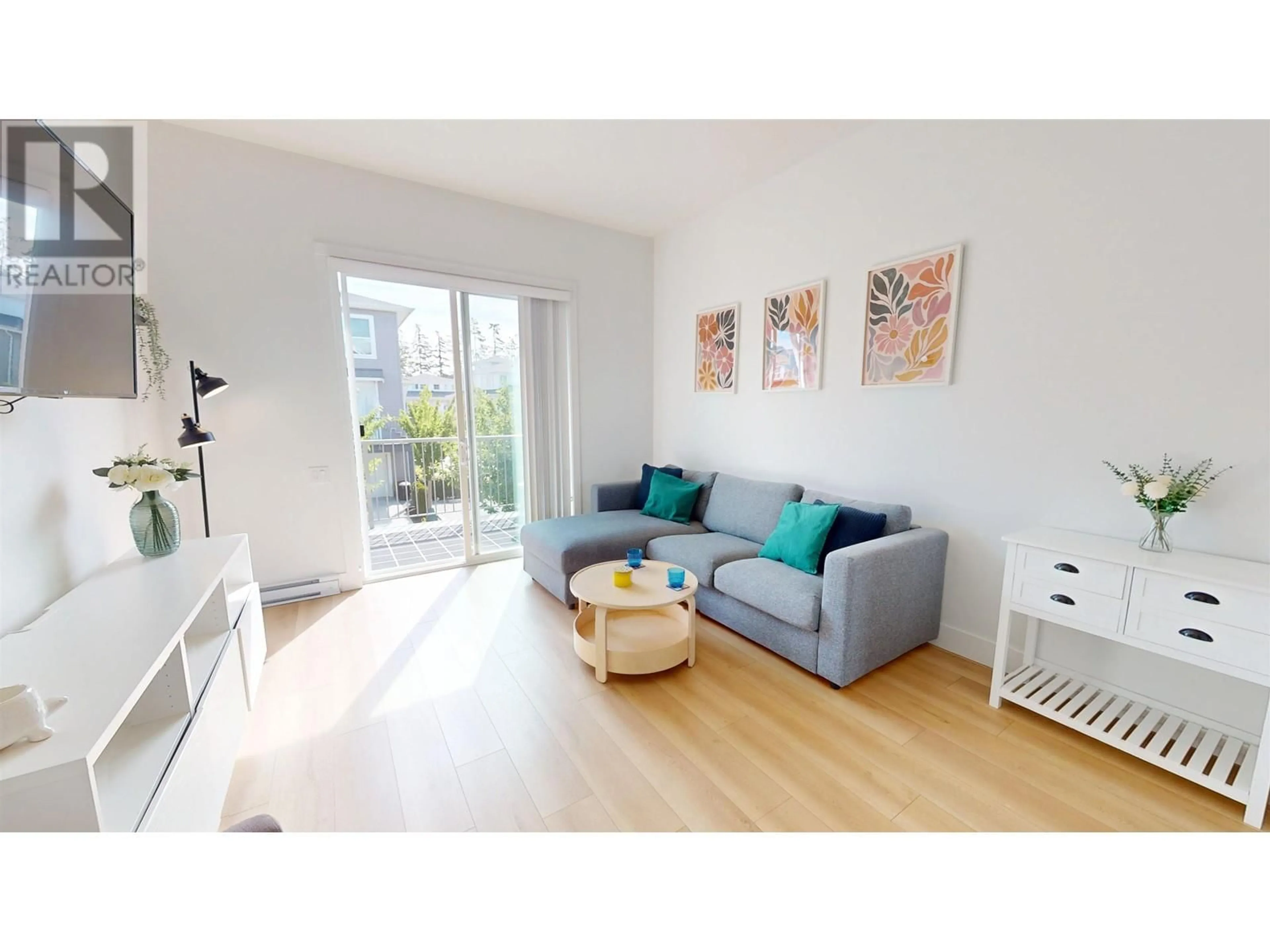 Living room with furniture, wood/laminate floor for 27 - 4656 ORCA WAY, Tsawwassen British Columbia V4M0C9