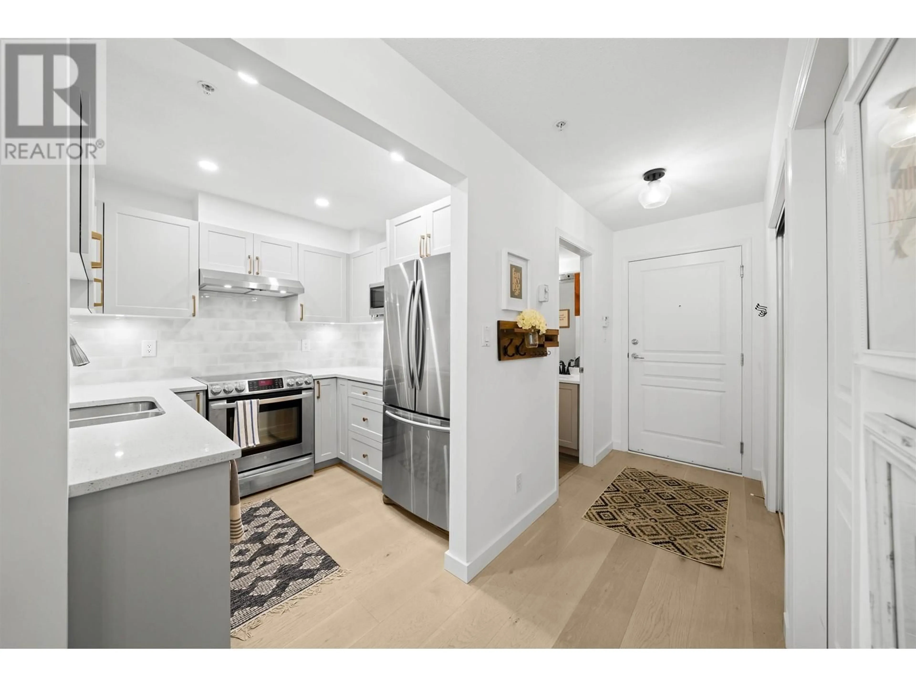 Open concept kitchen, unknown for 202 - 3333 4TH AVENUE, Vancouver British Columbia V6R4R9