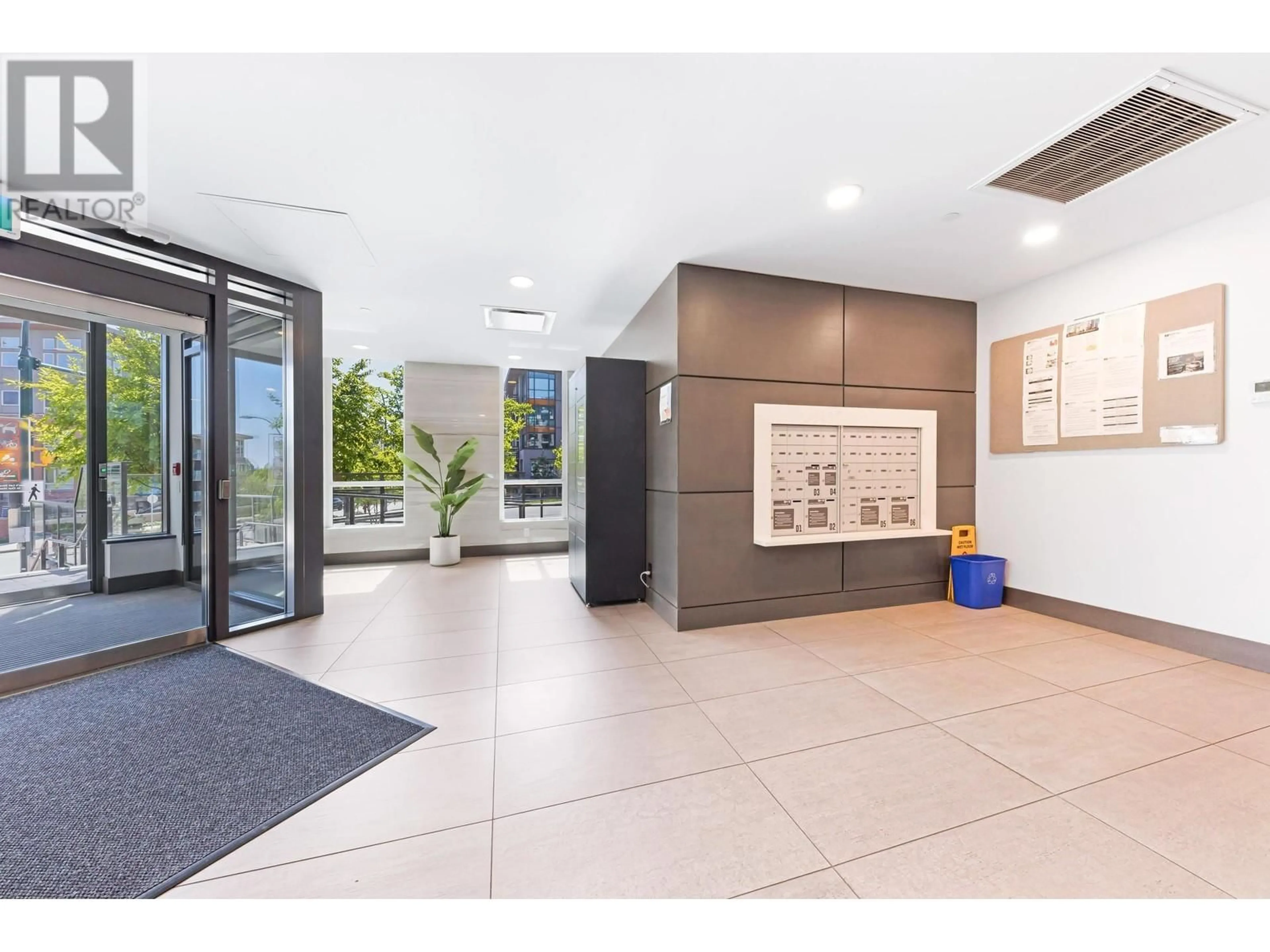 Indoor foyer for 301 - 2707 LIBRARY LANE, North Vancouver British Columbia V7J0C6