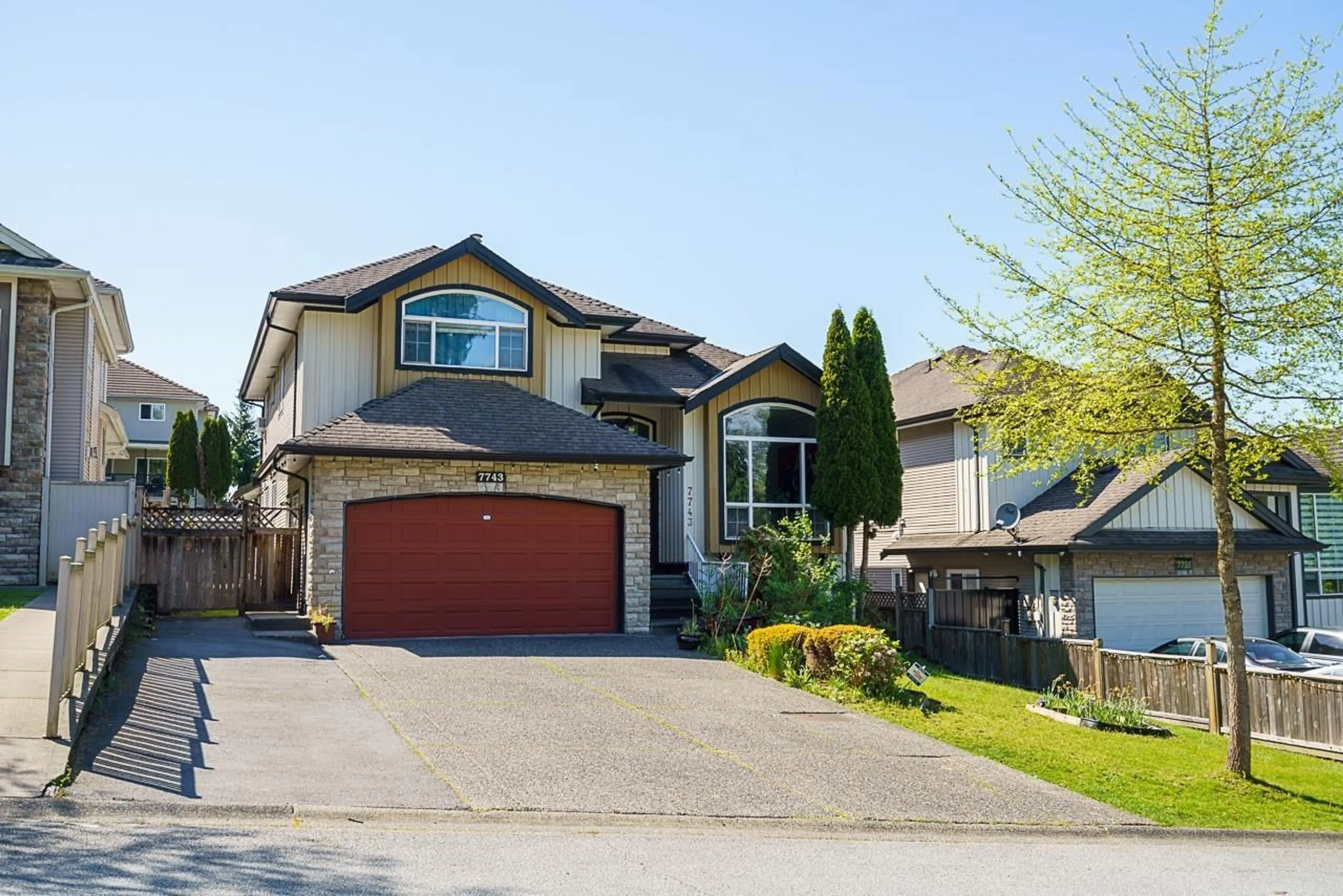 Home with vinyl exterior material, street for 7743 145A, Surrey British Columbia V3S9C3