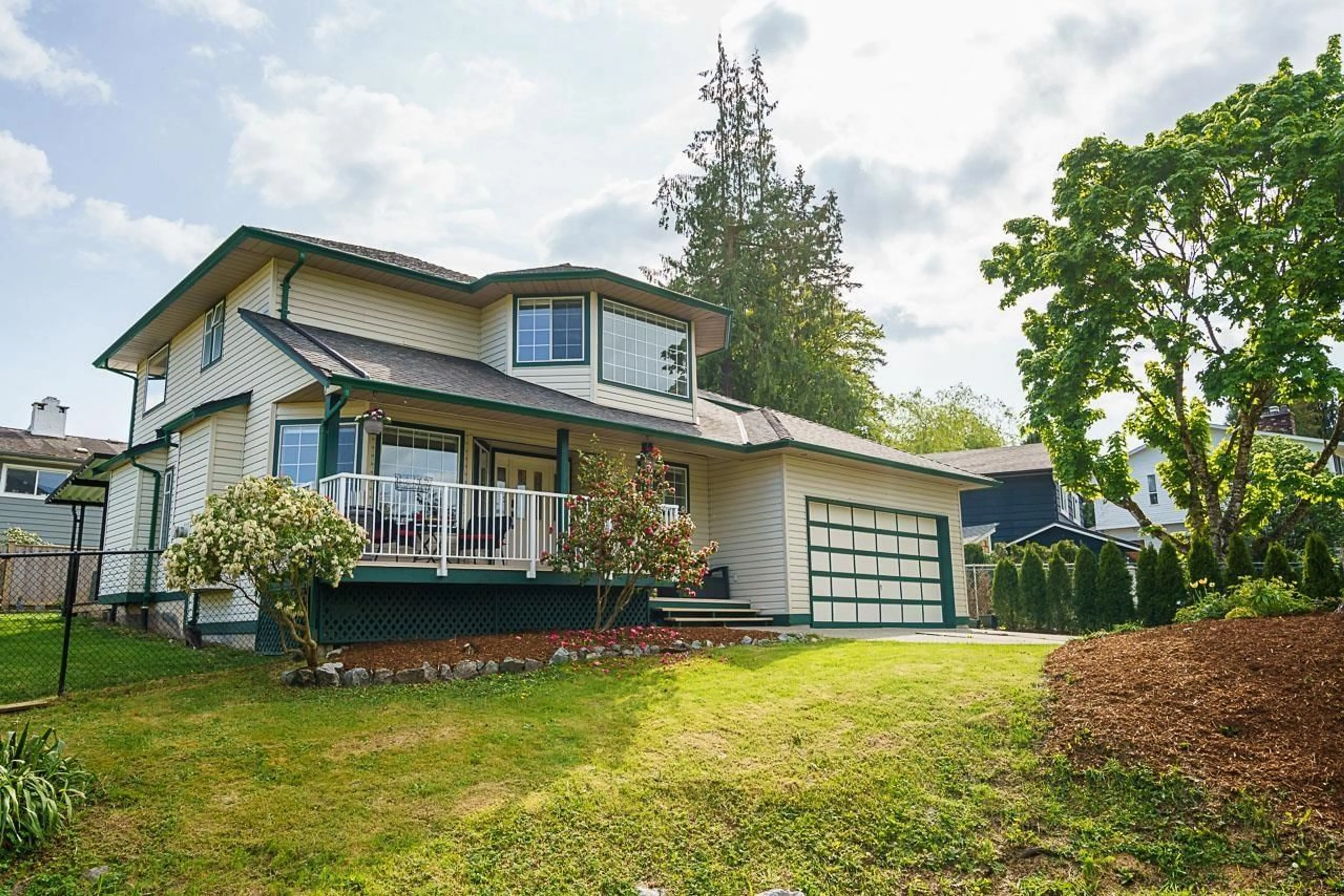 Home with vinyl exterior material, street for 19950 48A, Langley British Columbia V3A6Z7
