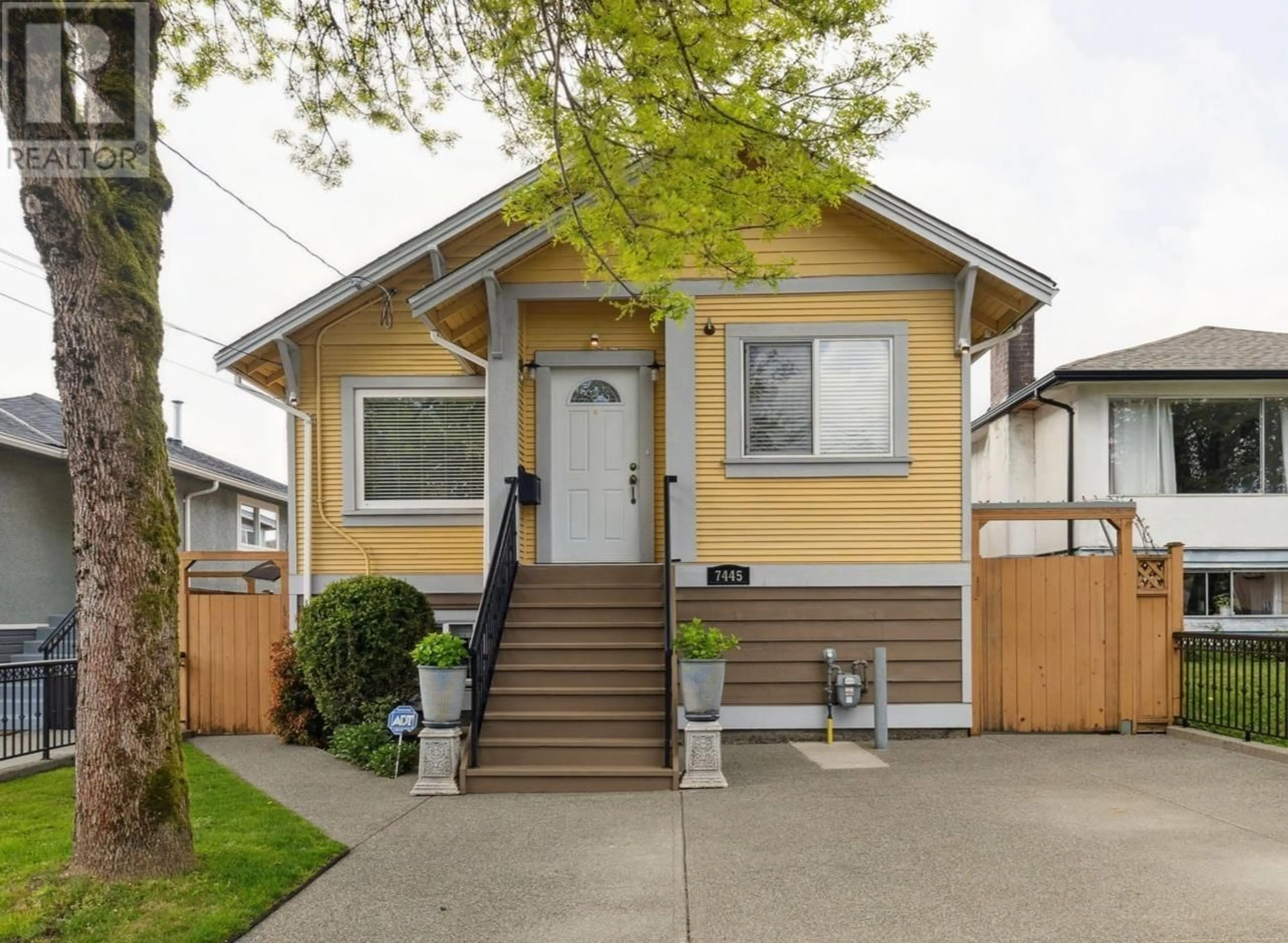 Home with vinyl exterior material, street for 7445 19TH AVENUE, Burnaby British Columbia V3N1E2