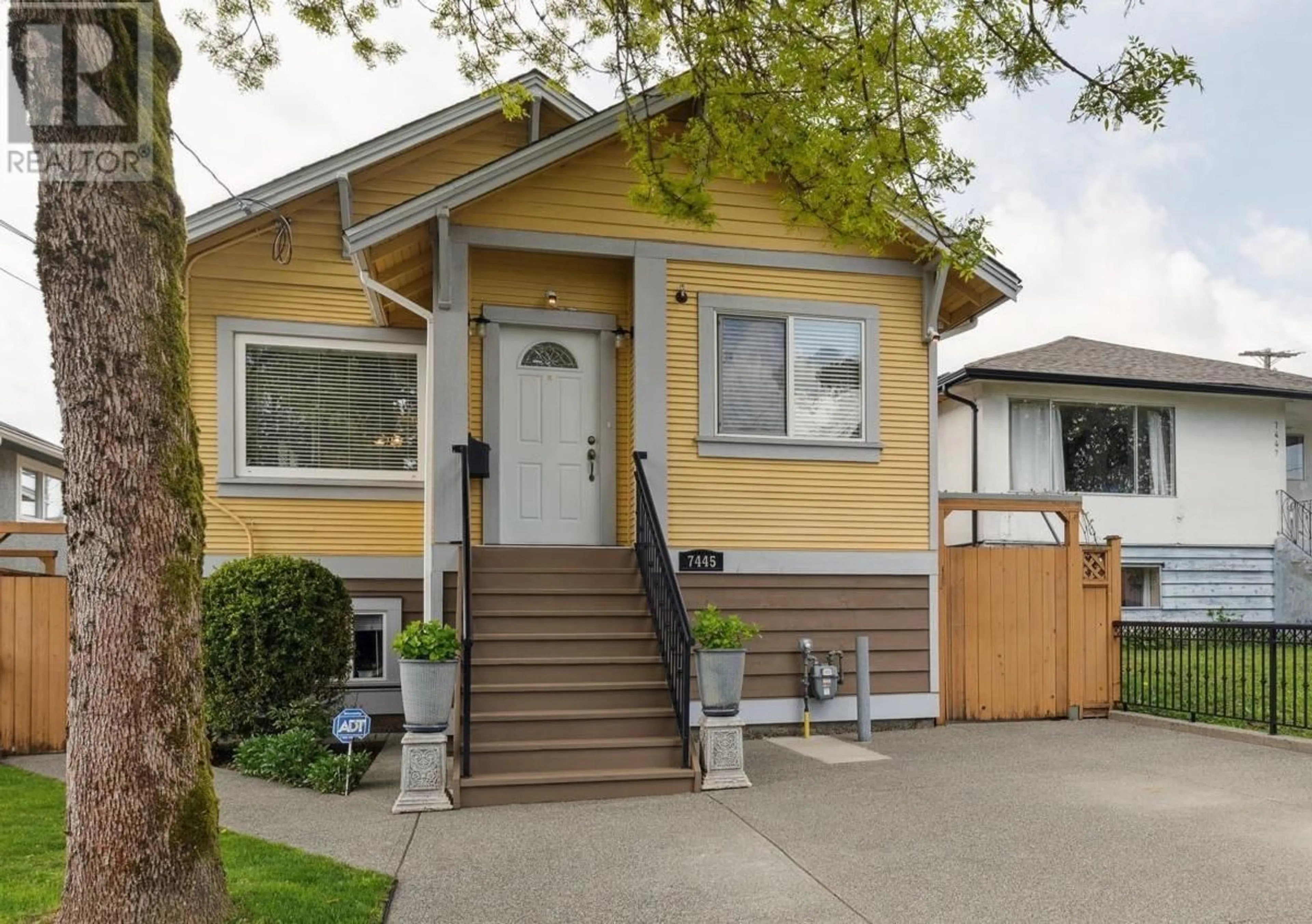 Home with vinyl exterior material, street for 7445 19TH AVENUE, Burnaby British Columbia V3N1E2