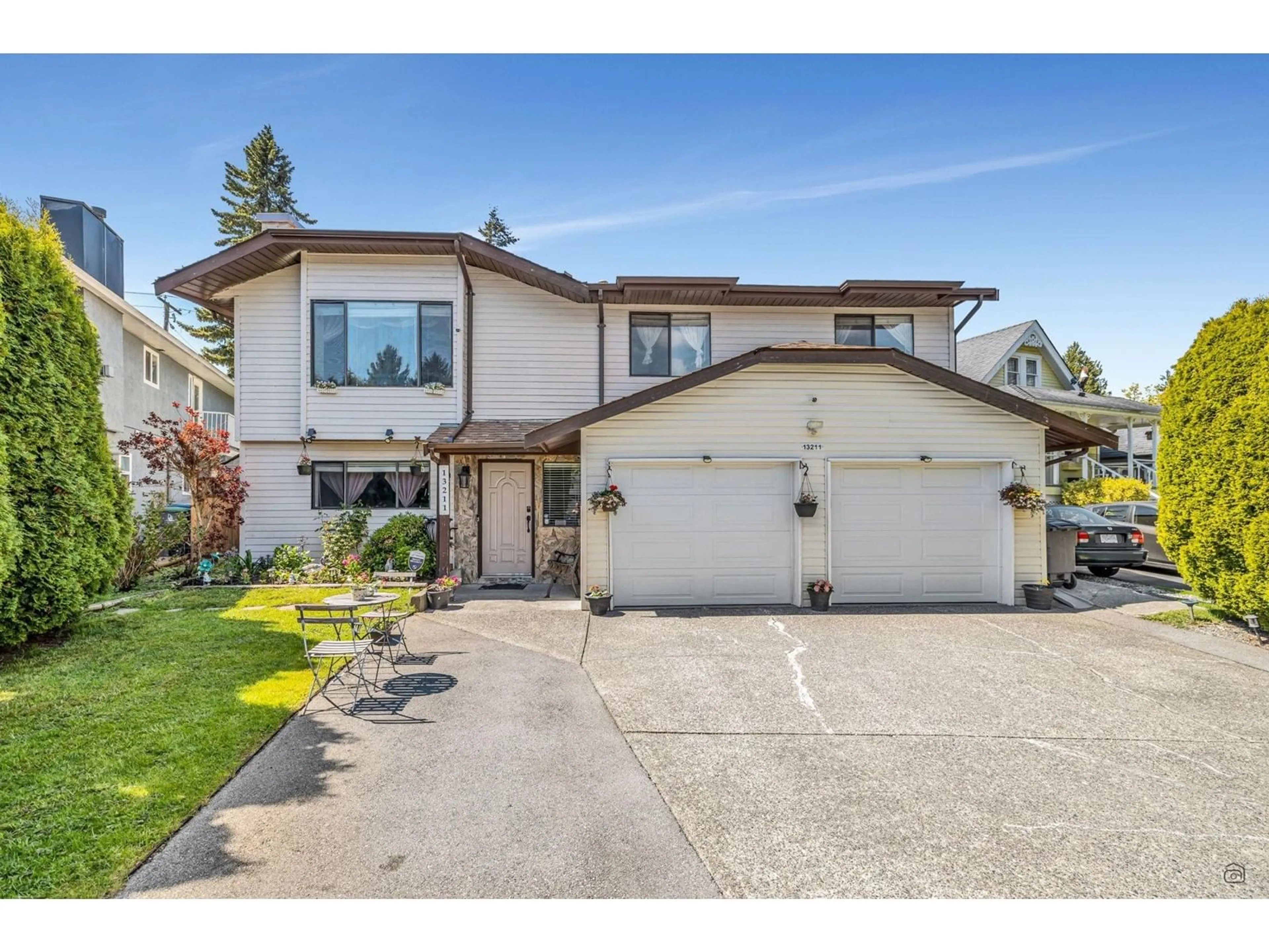 Home with vinyl exterior material, street for 13211 66A, Surrey British Columbia V3W8E3