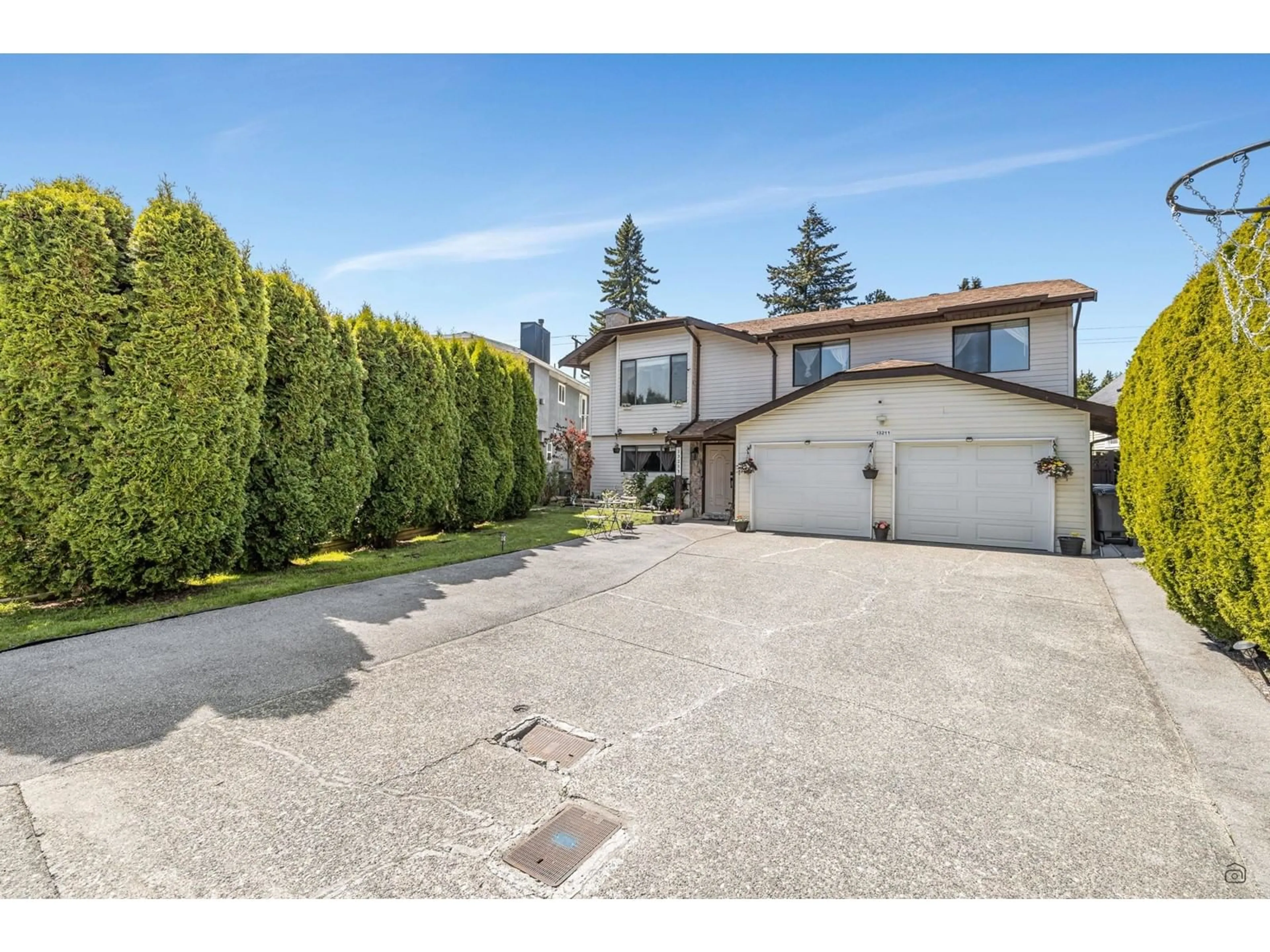 A pic from outside/outdoor area/front of a property/back of a property/a pic from drone, street for 13211 66A, Surrey British Columbia V3W8E3