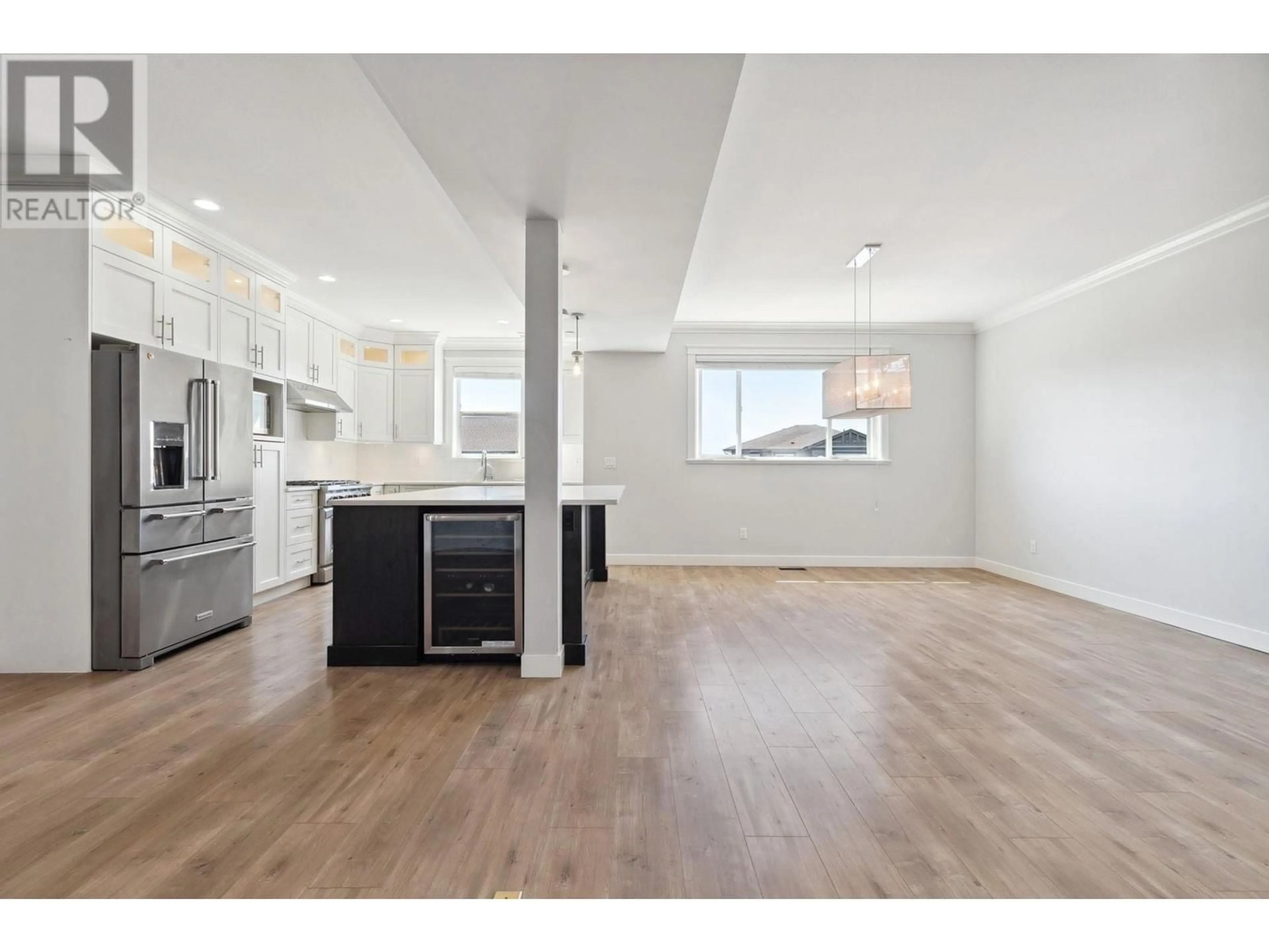 Open concept kitchen, wood/laminate floor for 23575 LARCH AVENUE, Maple Ridge British Columbia V4R0E4