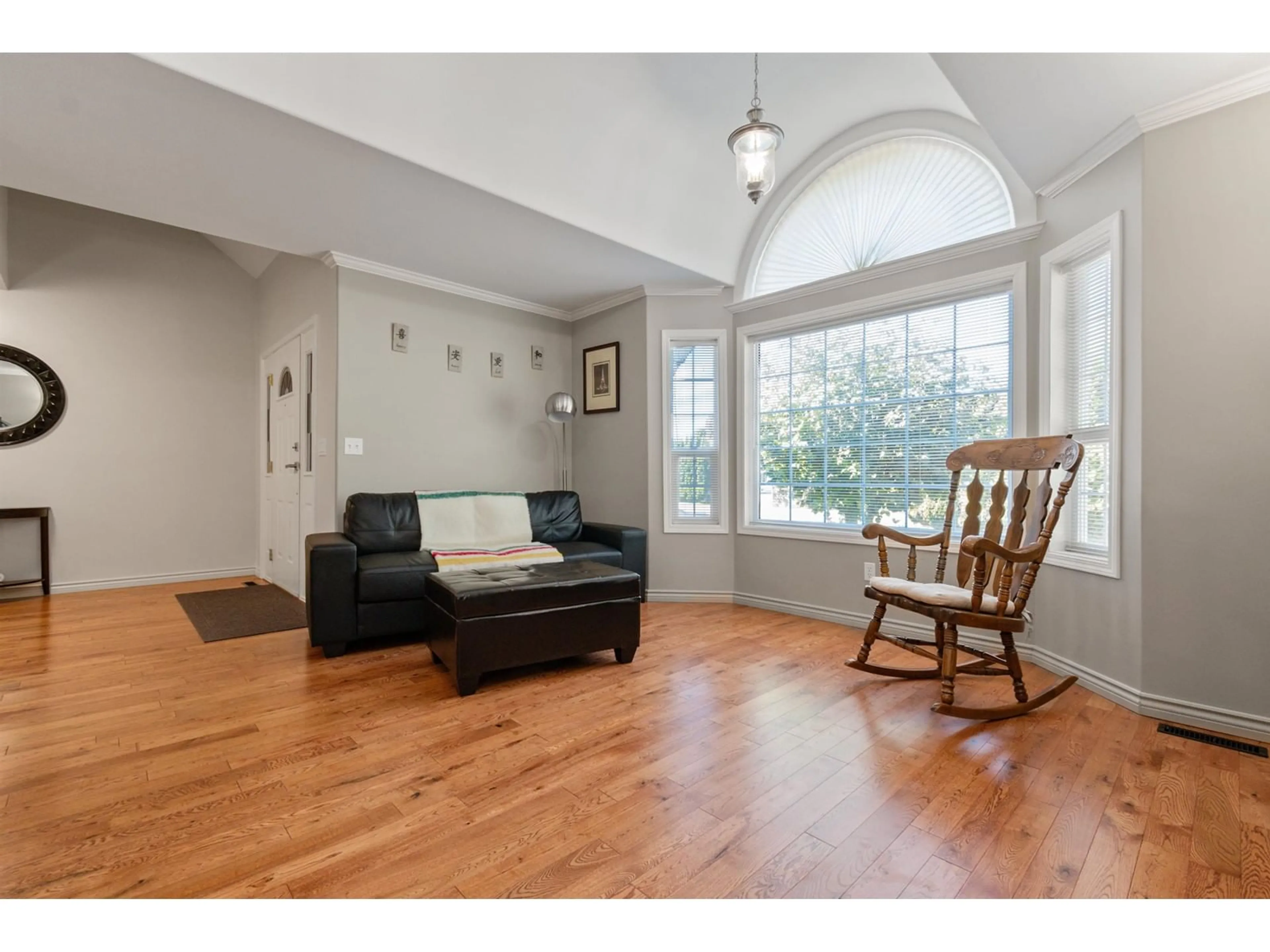 Living room with furniture, wood/laminate floor for 4470 ANITA STREET, Yarrow British Columbia V2R5E3