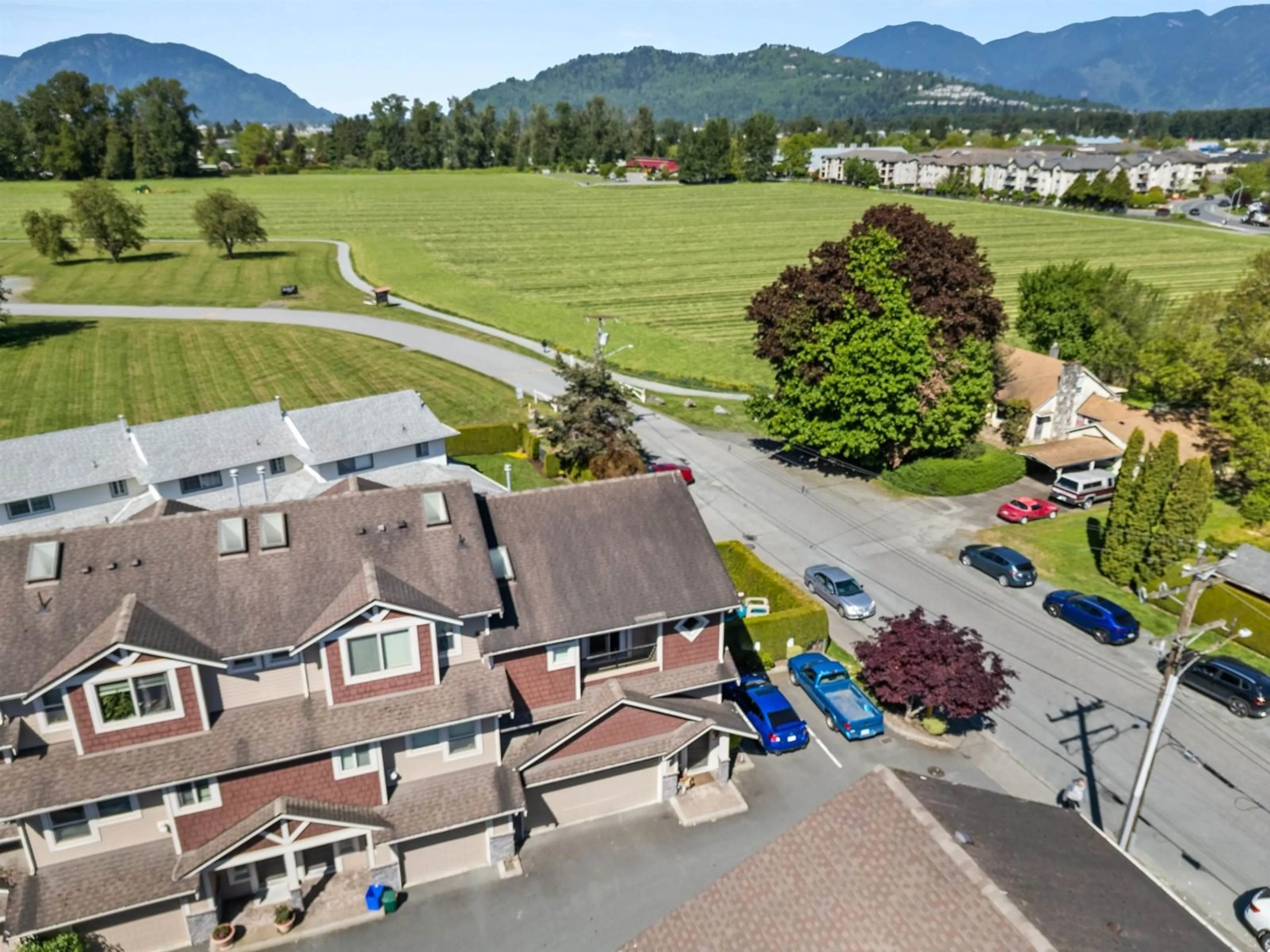 A pic from outside/outdoor area/front of a property/back of a property/a pic from drone, mountain view for 1 - 45624 STOREY AVENUE, Chilliwack British Columbia V2R0H7