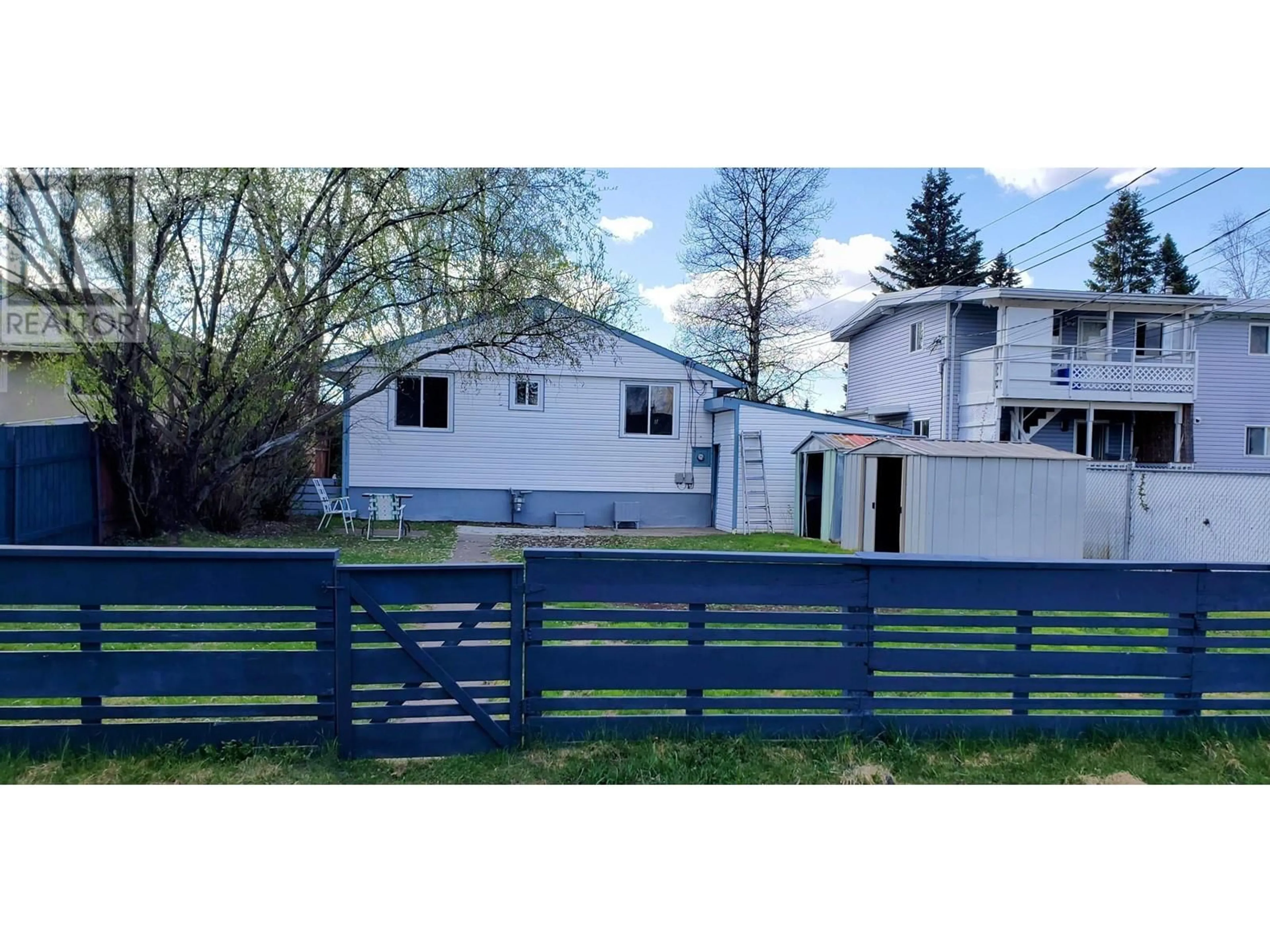 A pic from outside/outdoor area/front of a property/back of a property/a pic from drone, street for 242 JOHNSON STREET, Prince George British Columbia V2M2Z5