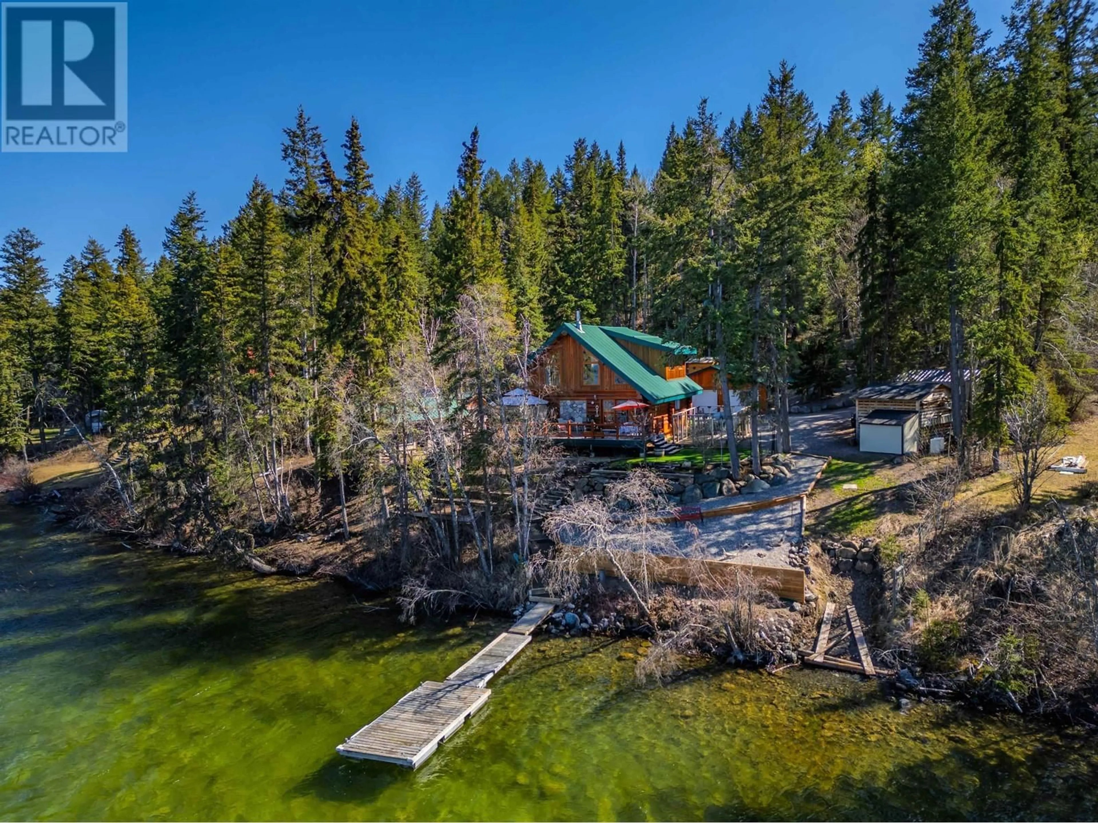 A pic from outside/outdoor area/front of a property/back of a property/a pic from drone, water/lake/river/ocean view for 4677 CAVERLY ROAD, Lac La Hache British Columbia V0K1T0