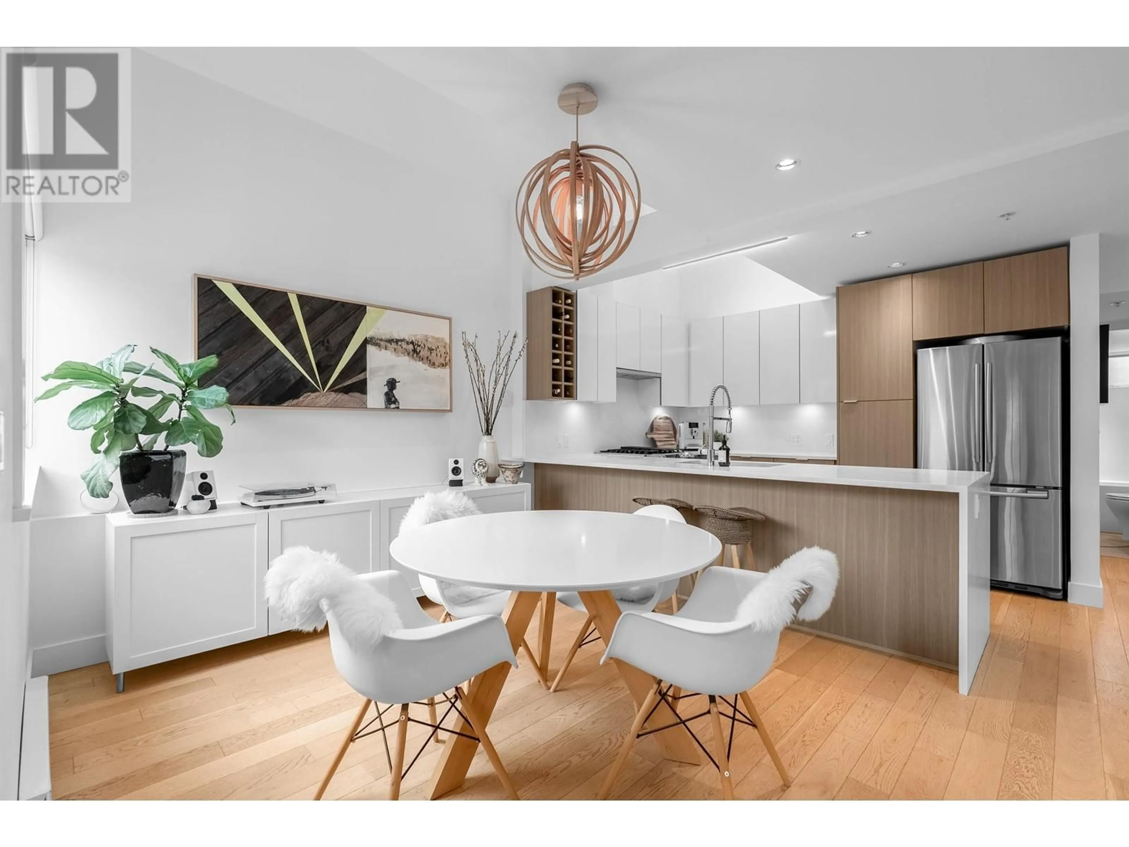 Open concept kitchen, wood/laminate floor for 367 16TH AVENUE, Vancouver British Columbia V5T2T7