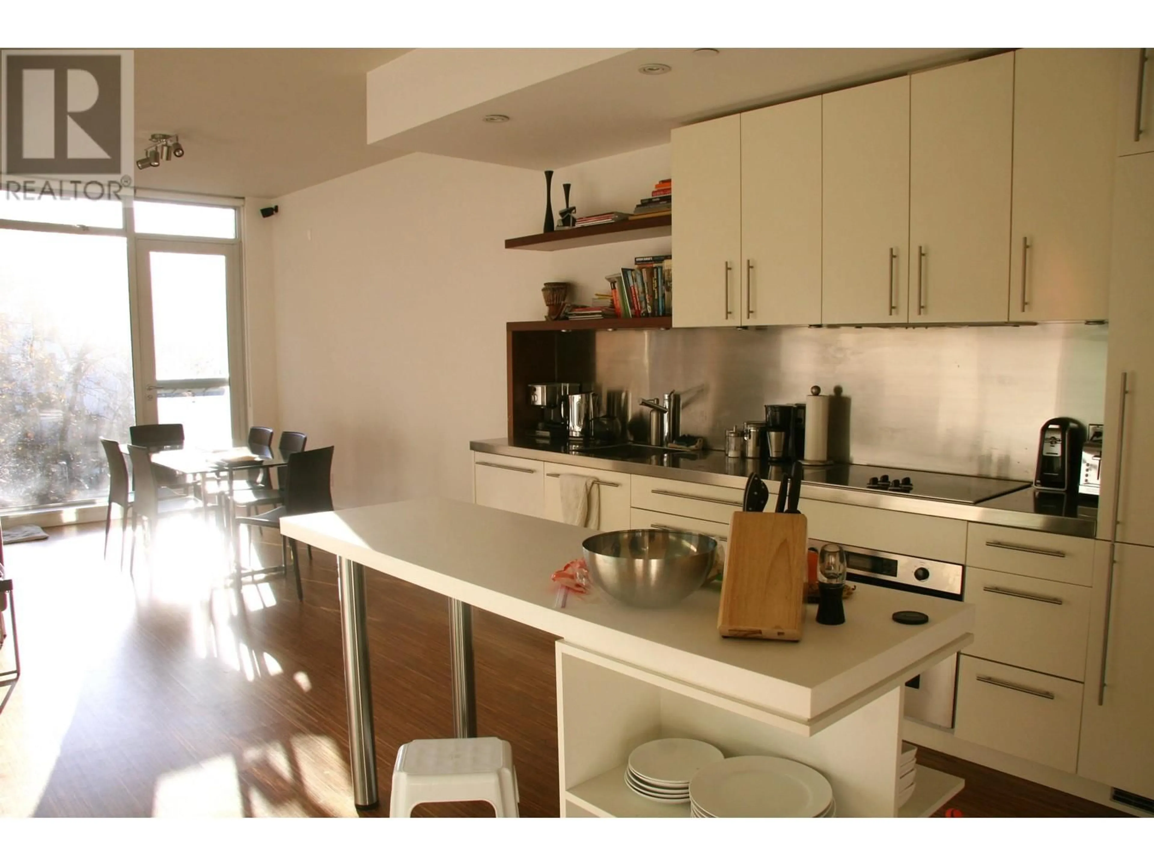 Open concept kitchen, wood/laminate floor for 506 - 36 WATER STREET, Vancouver British Columbia V6B0B7