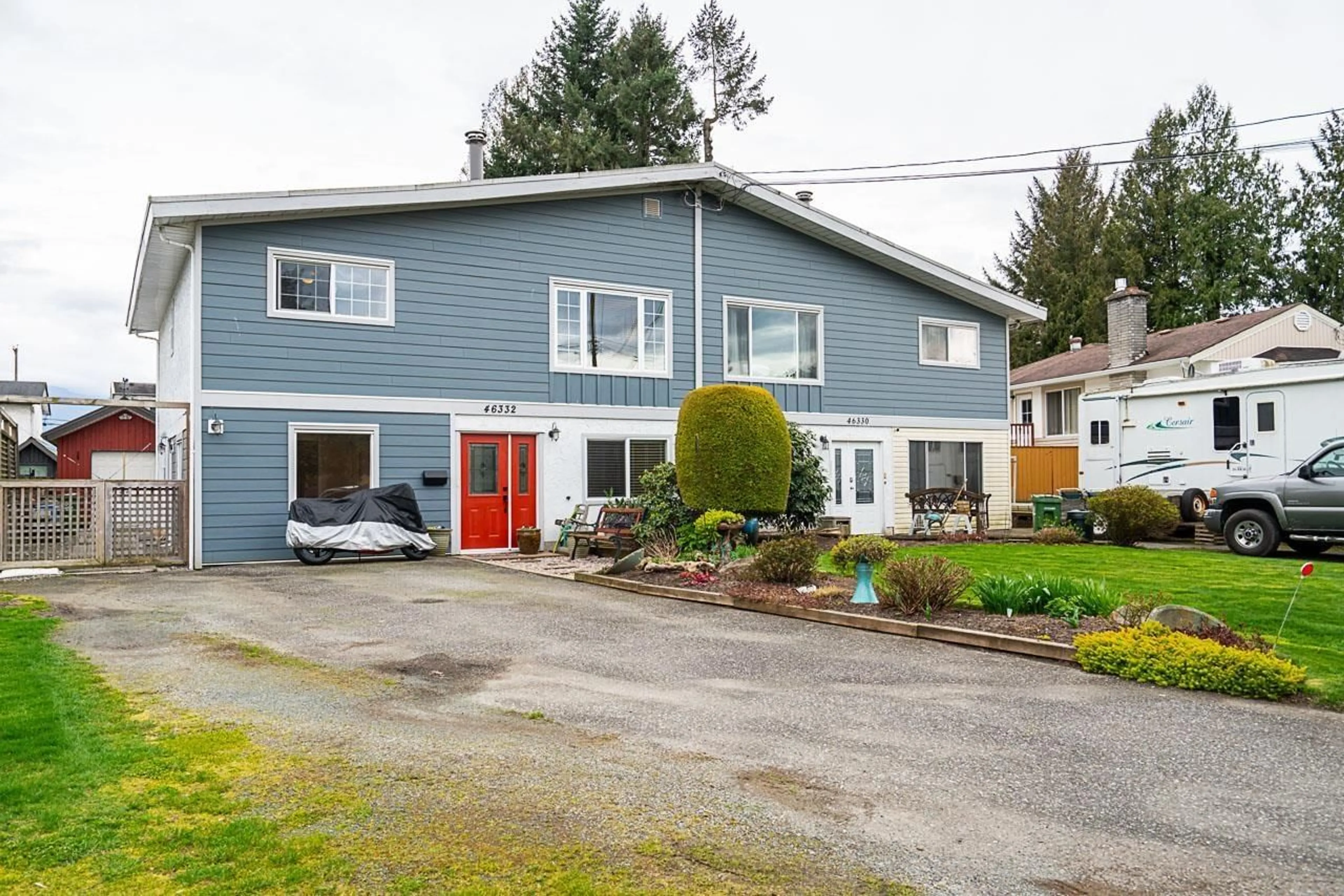 Home with vinyl exterior material, street for 46332 MCCAFFREY BOULEVARD, Chilliwack British Columbia V2P1E1