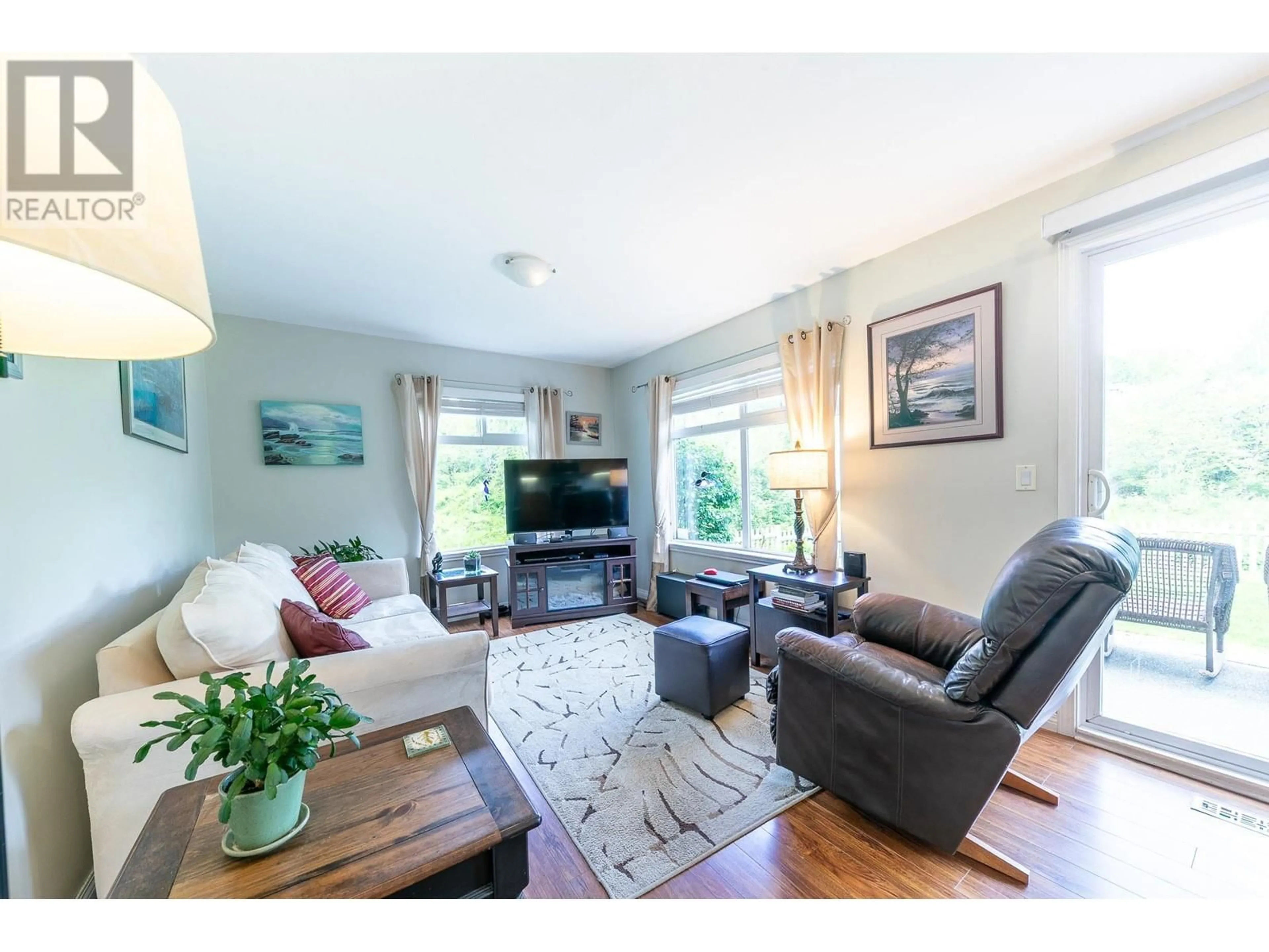 Living room with furniture, wood/laminate floor for 19 - 23343 KANAKA WAY, Maple Ridge British Columbia V2W2B6