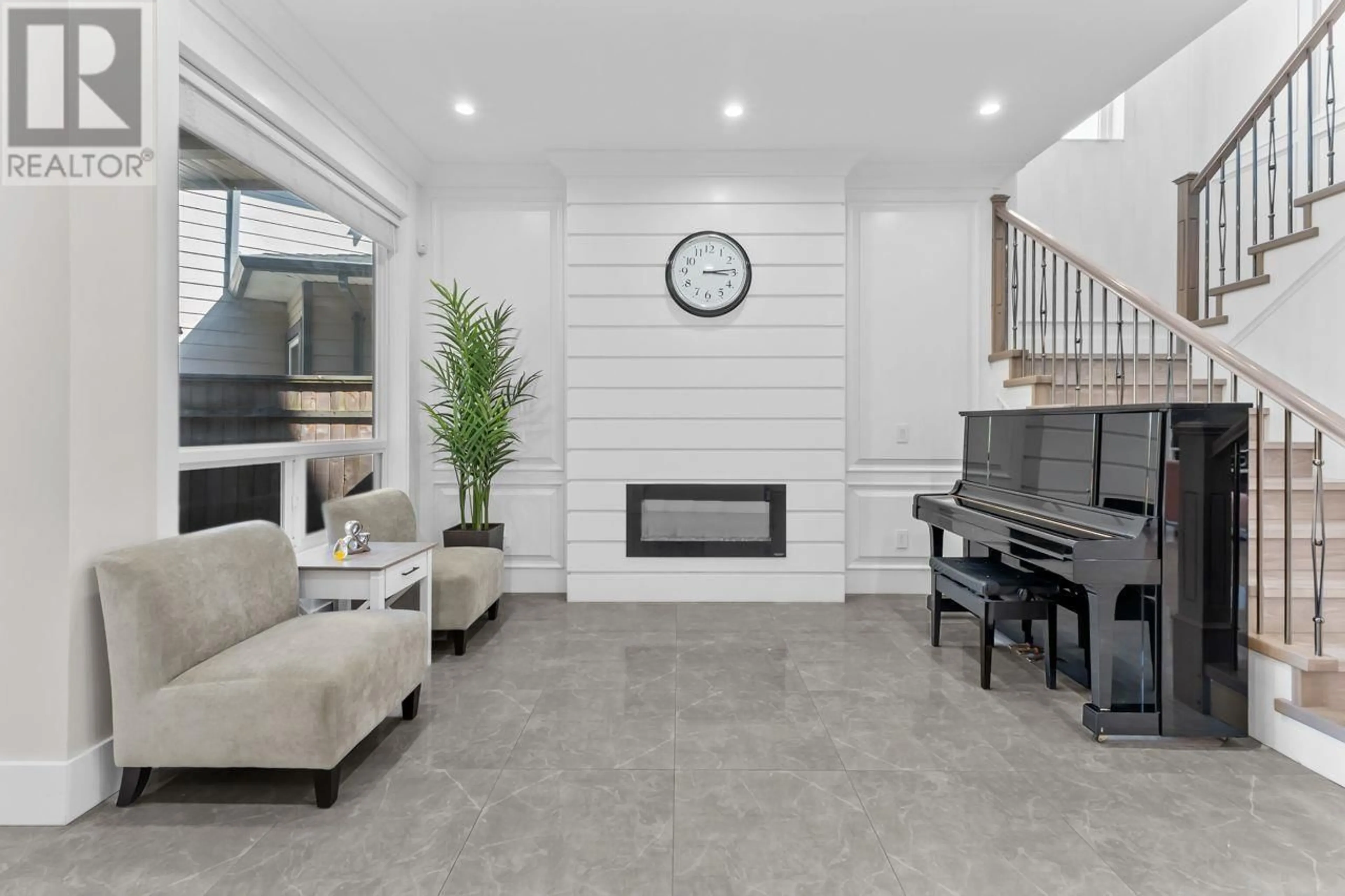 Living room with furniture, ceramic/tile floor for 9771 SEALILY PLACE, Richmond British Columbia V7A3Y1